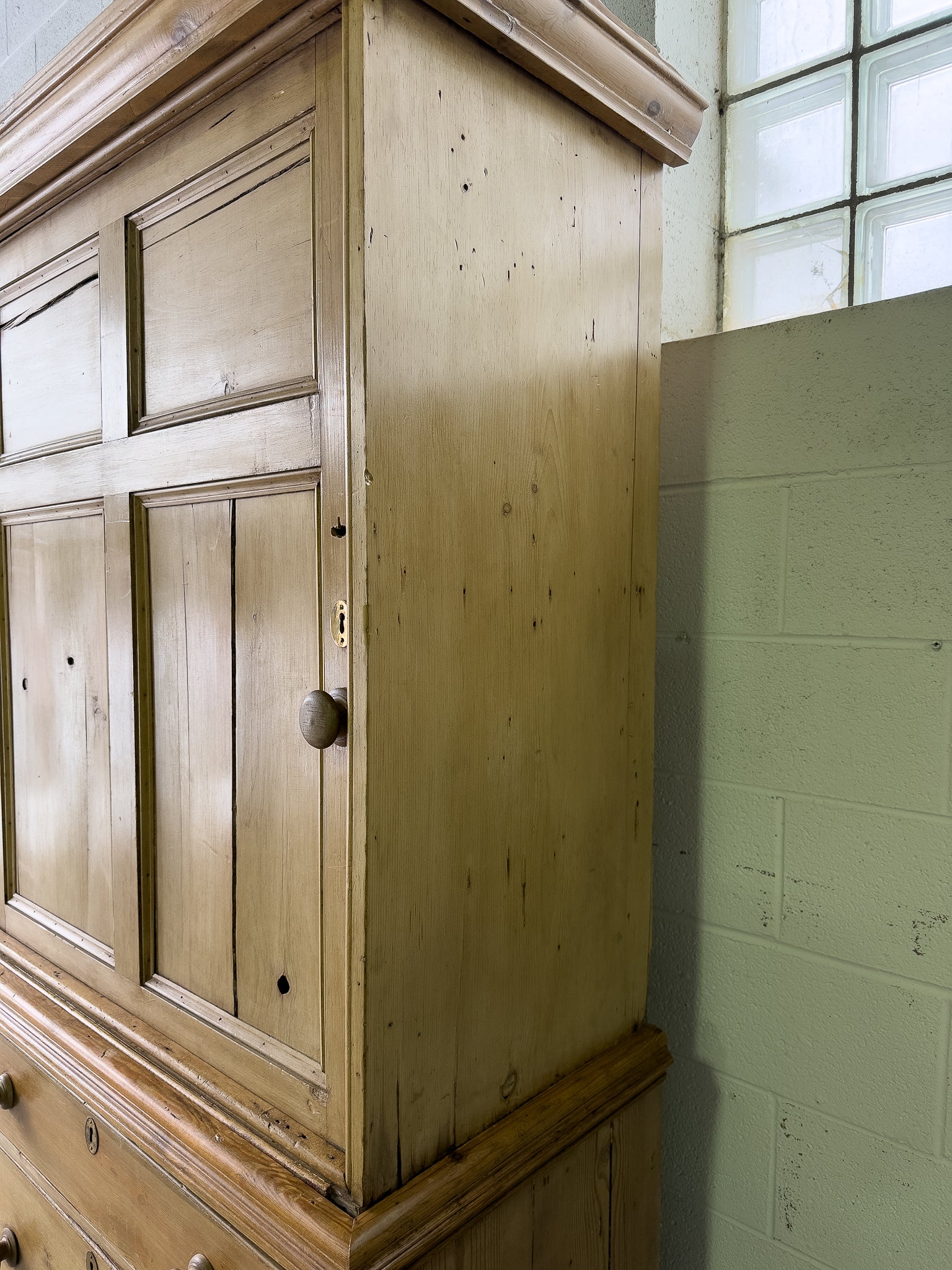 Large antique pine housekeepers cupboard with sliding doors