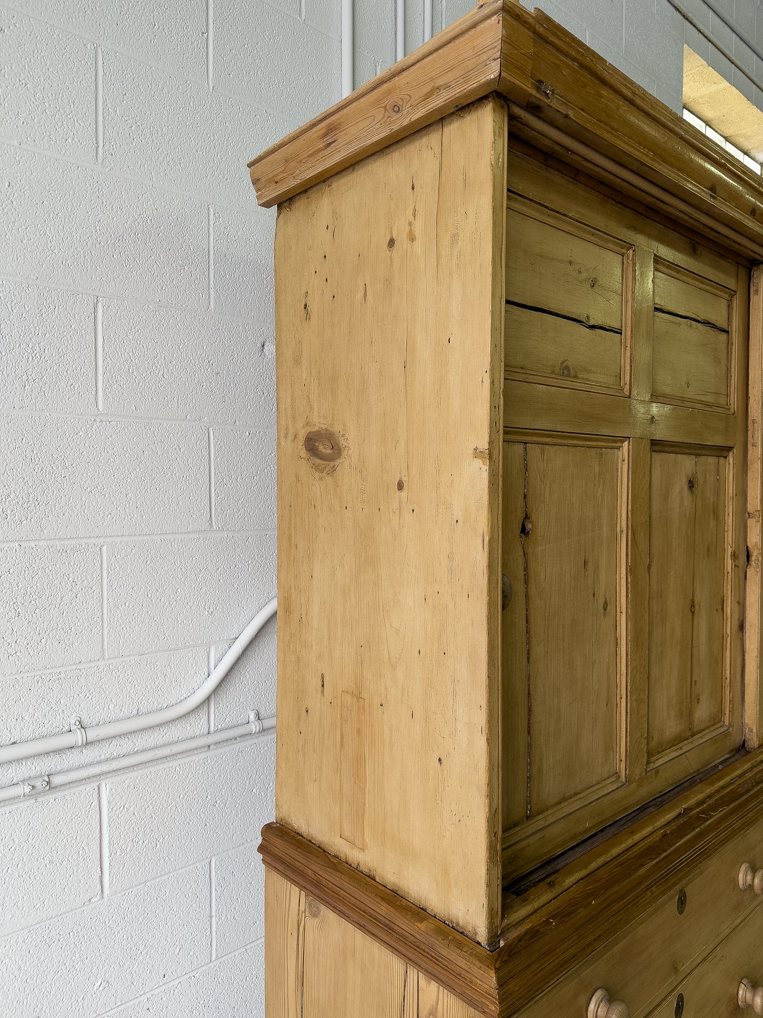 Large antique pine housekeepers cupboard with sliding doors