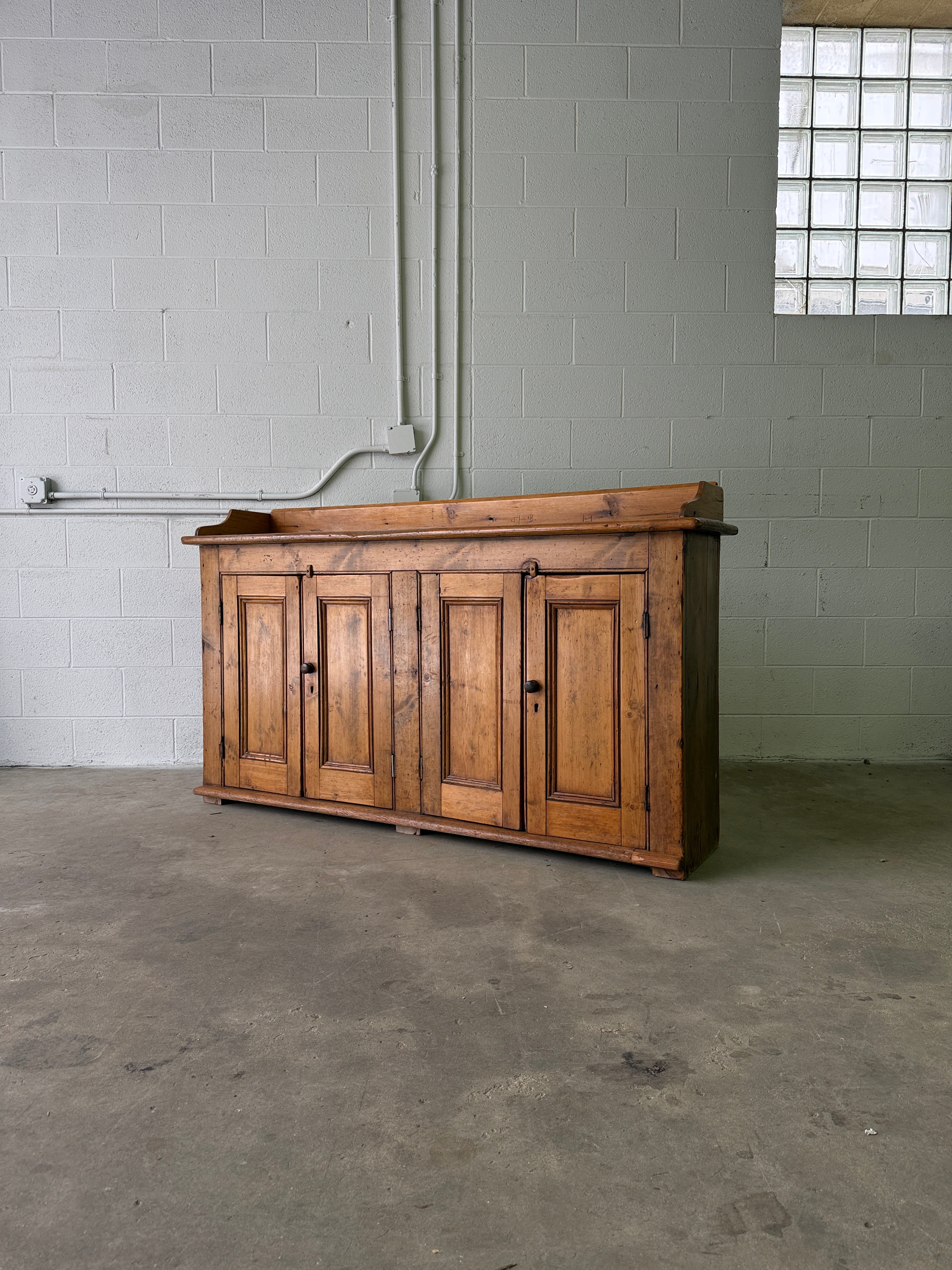 Antique pine sideboard with gallery back