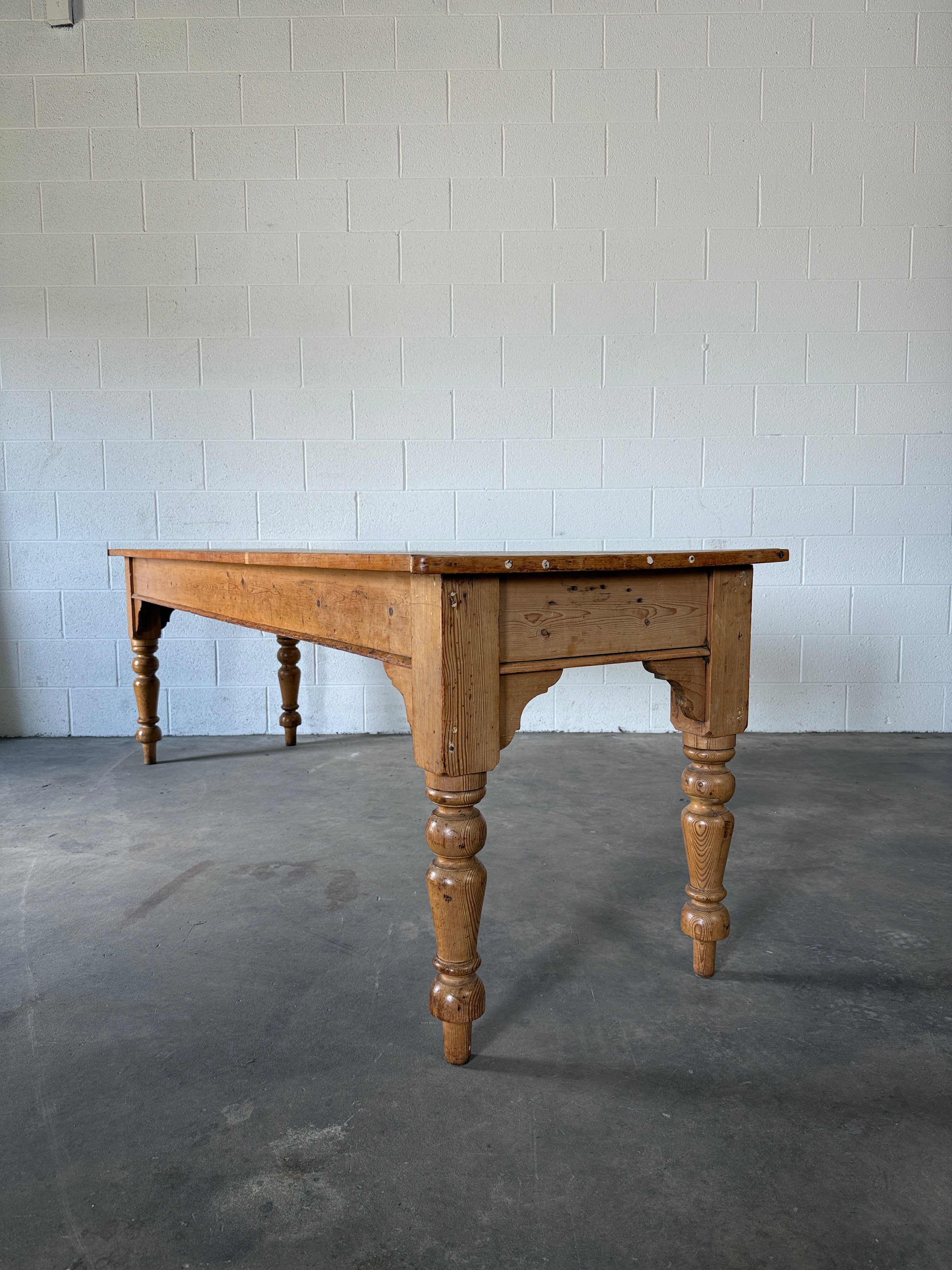 8’ antique pine dining table with detailed apron