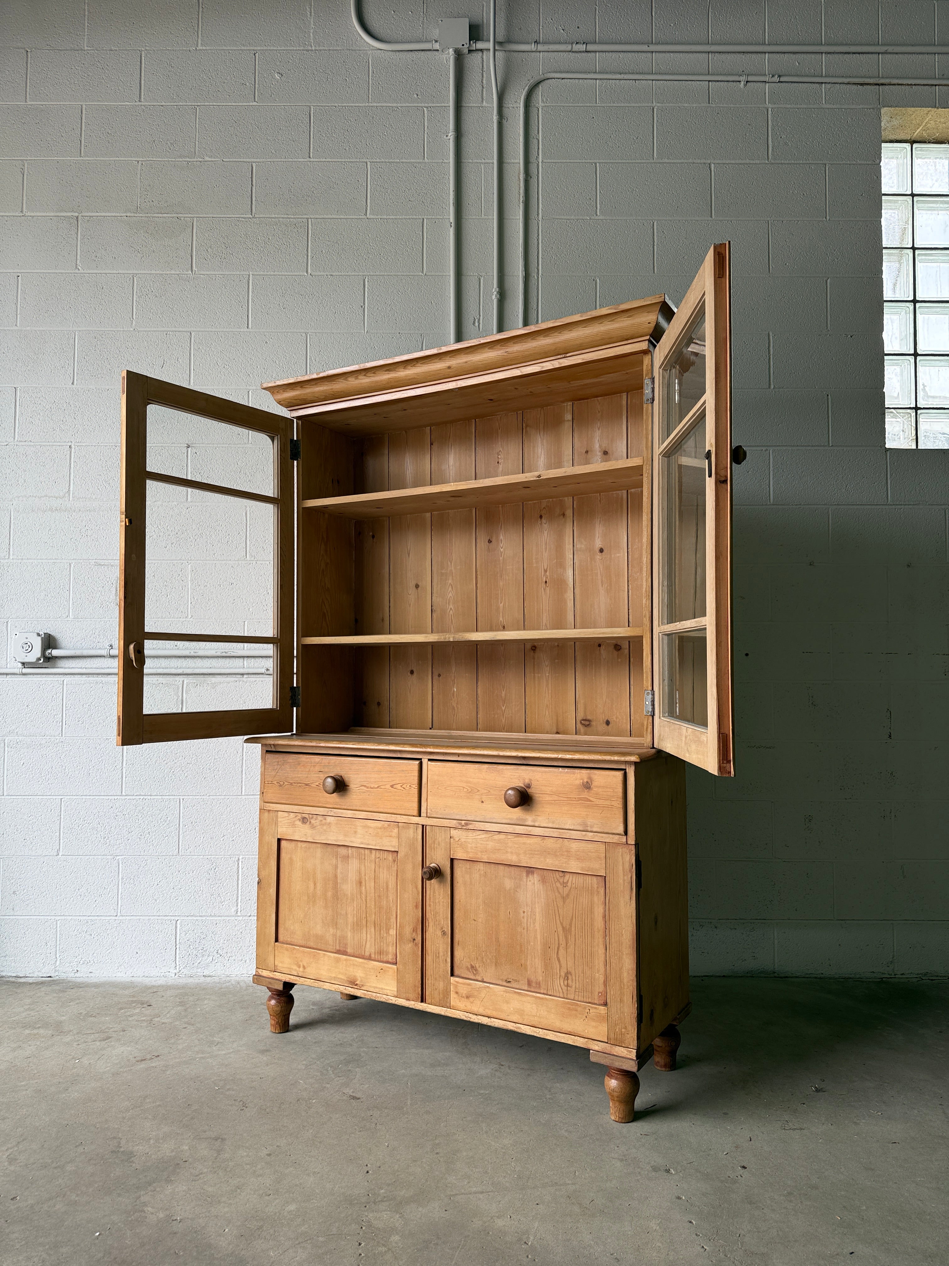Beautiful antique pine cupboard with original glass