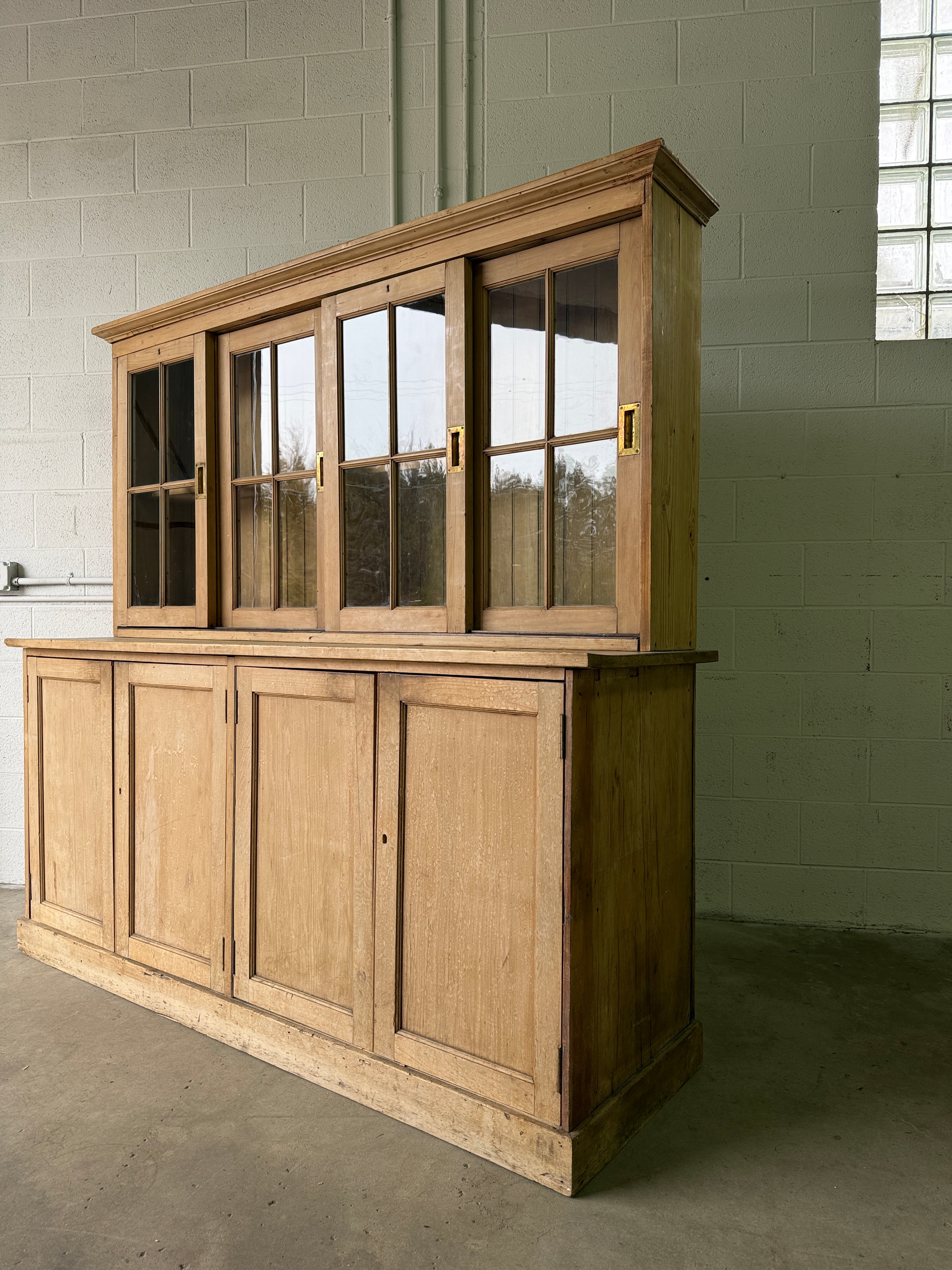 Victorian pine cupboard with glass sliding doors