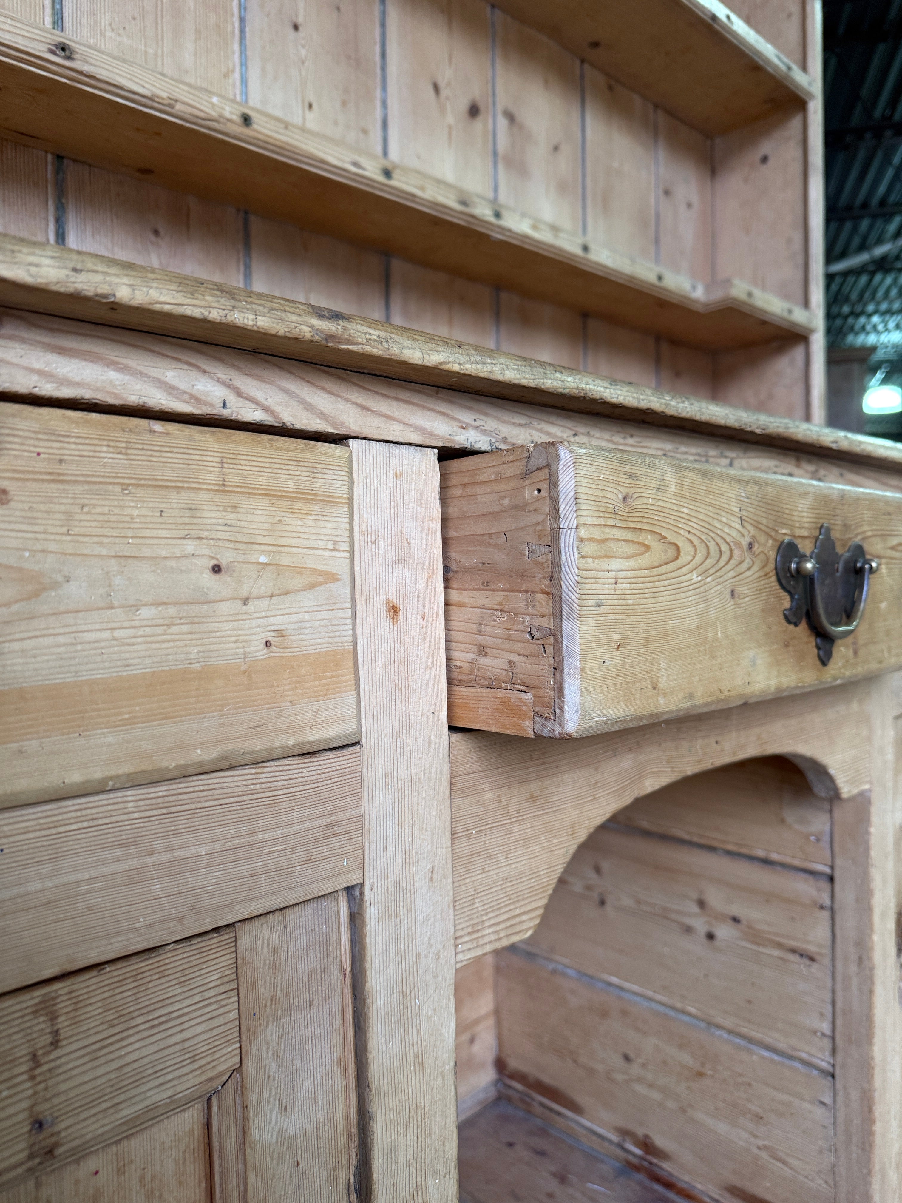 Striking antique pine kitchen dresser with brass pulls