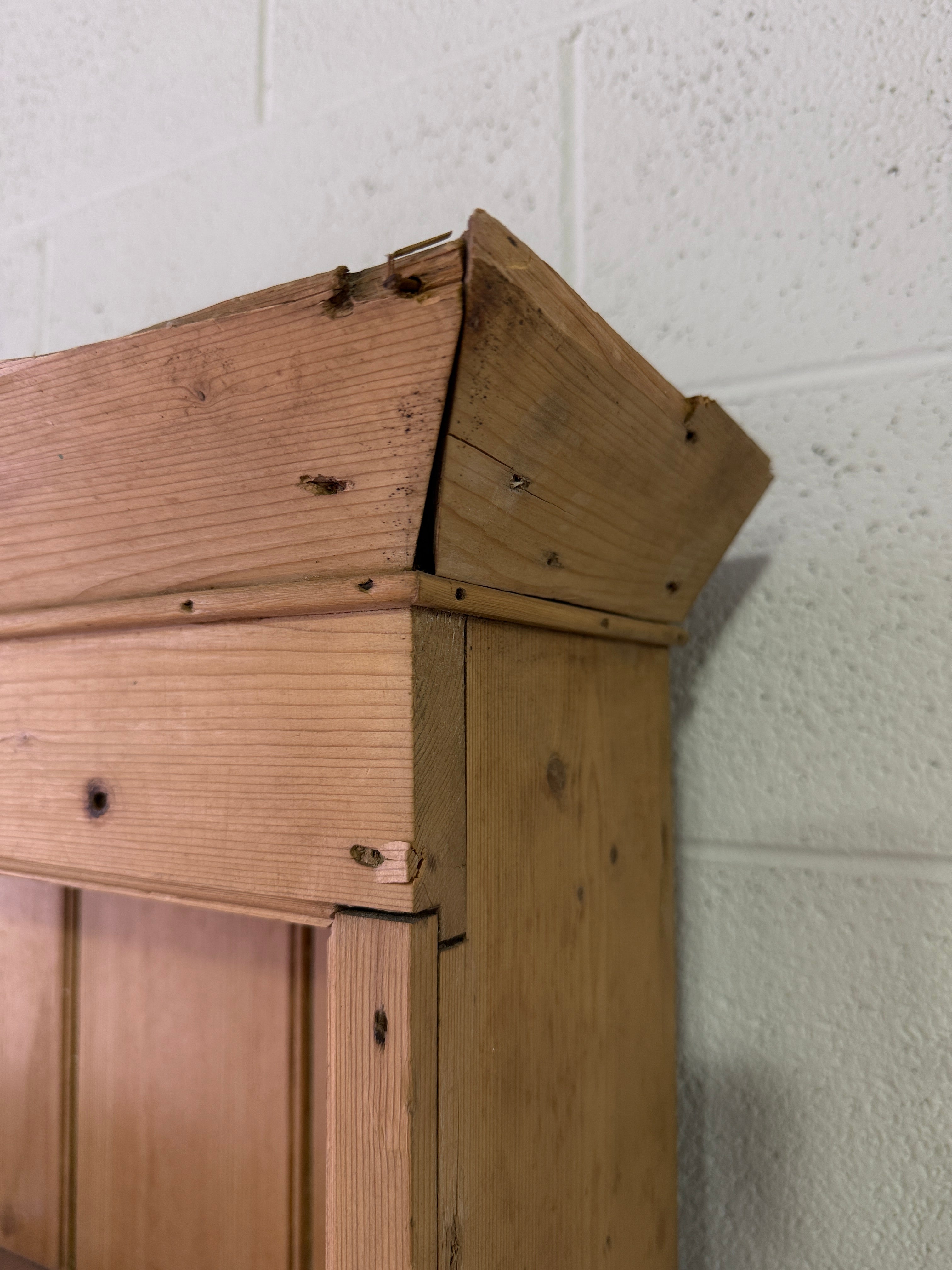 Striking antique pine kitchen dresser with brass pulls