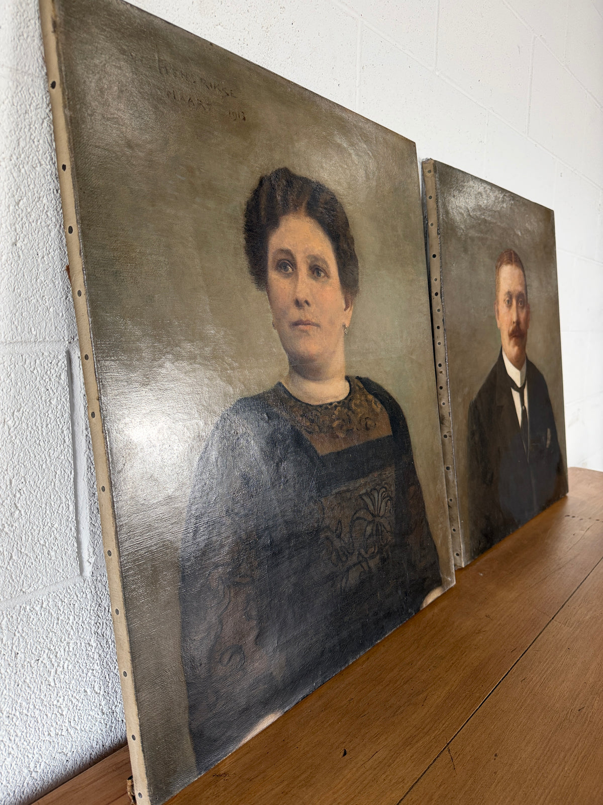 Pair of antique oil portraits