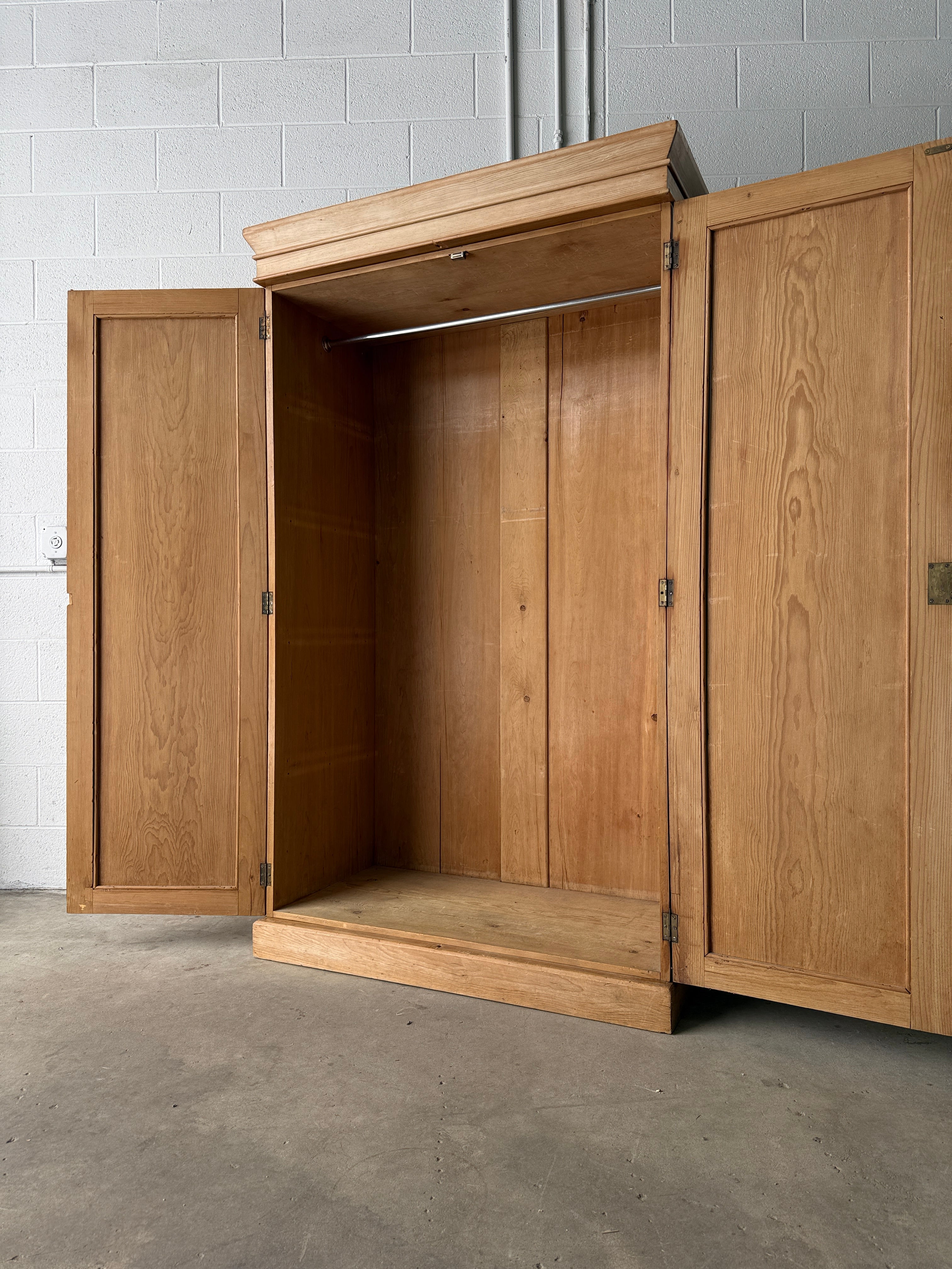 Modest antique English pine wardrobe