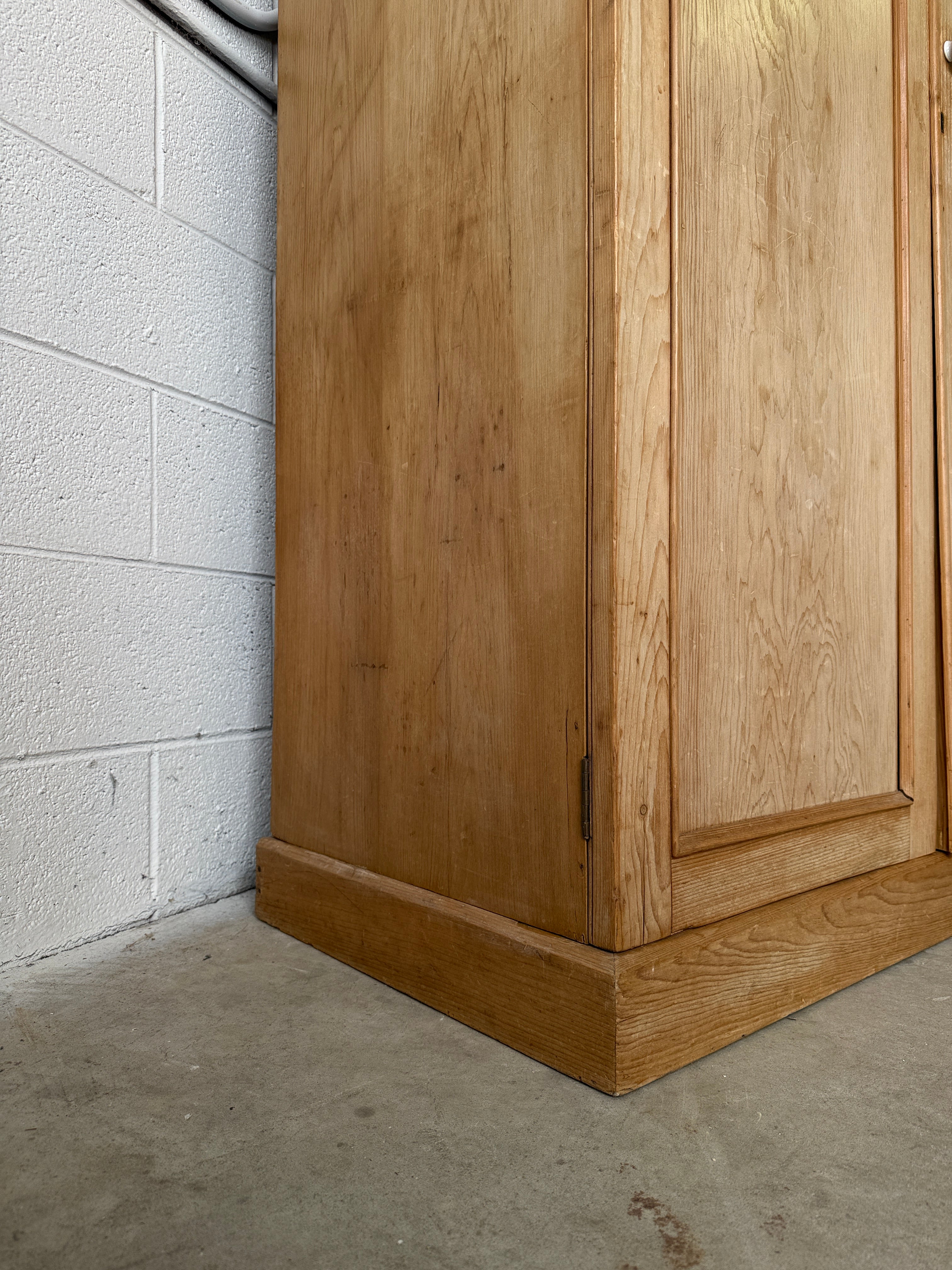 Modest antique English pine wardrobe