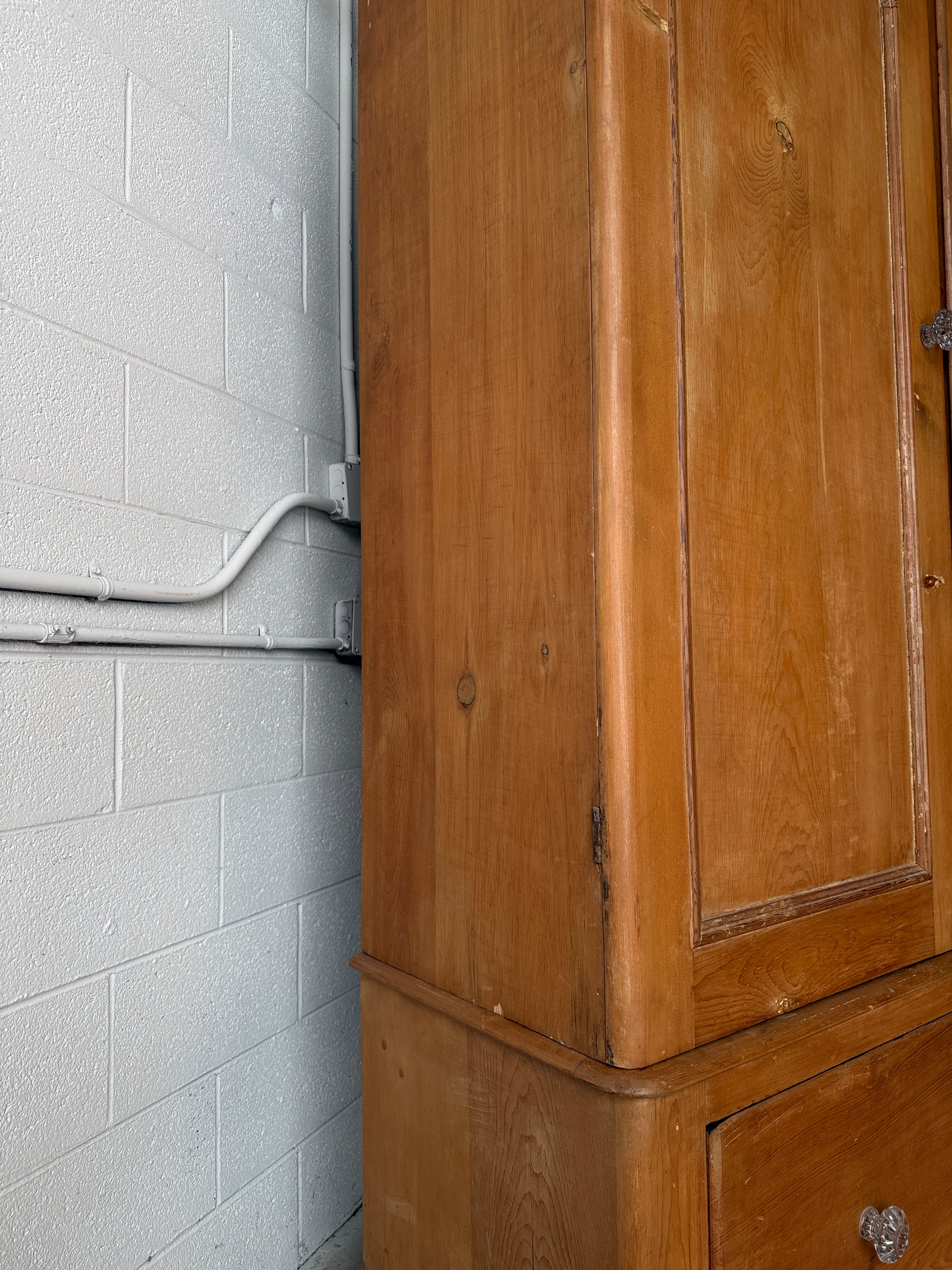 Substantial antique pine double wardrobe with painted interior