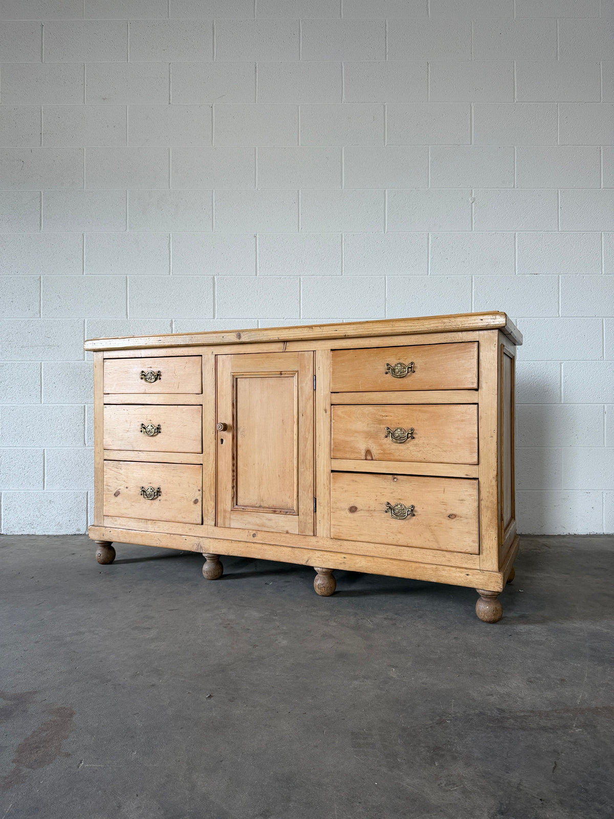 English pine sideboard with decorative pulls