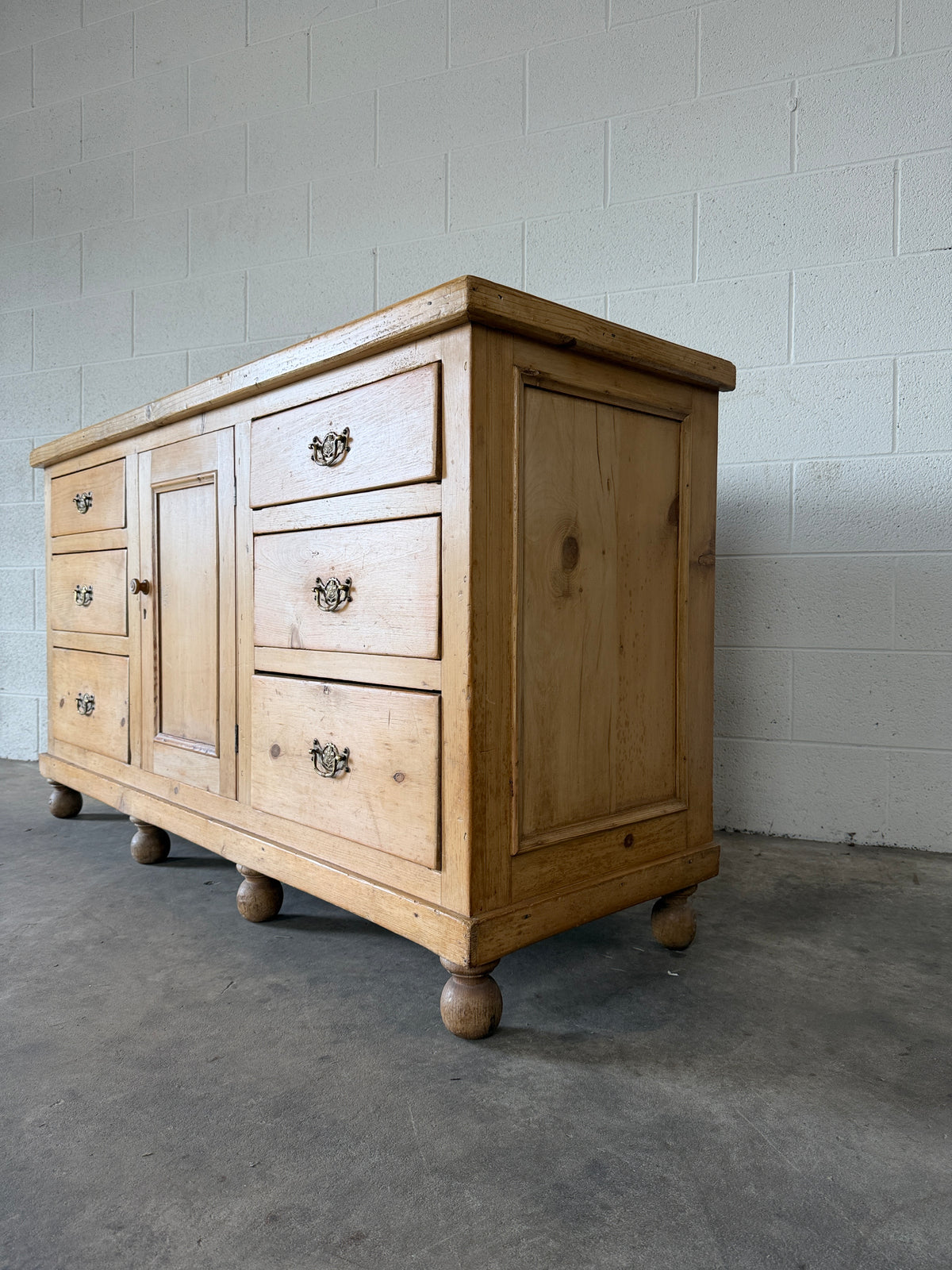 English pine sideboard with decorative pulls