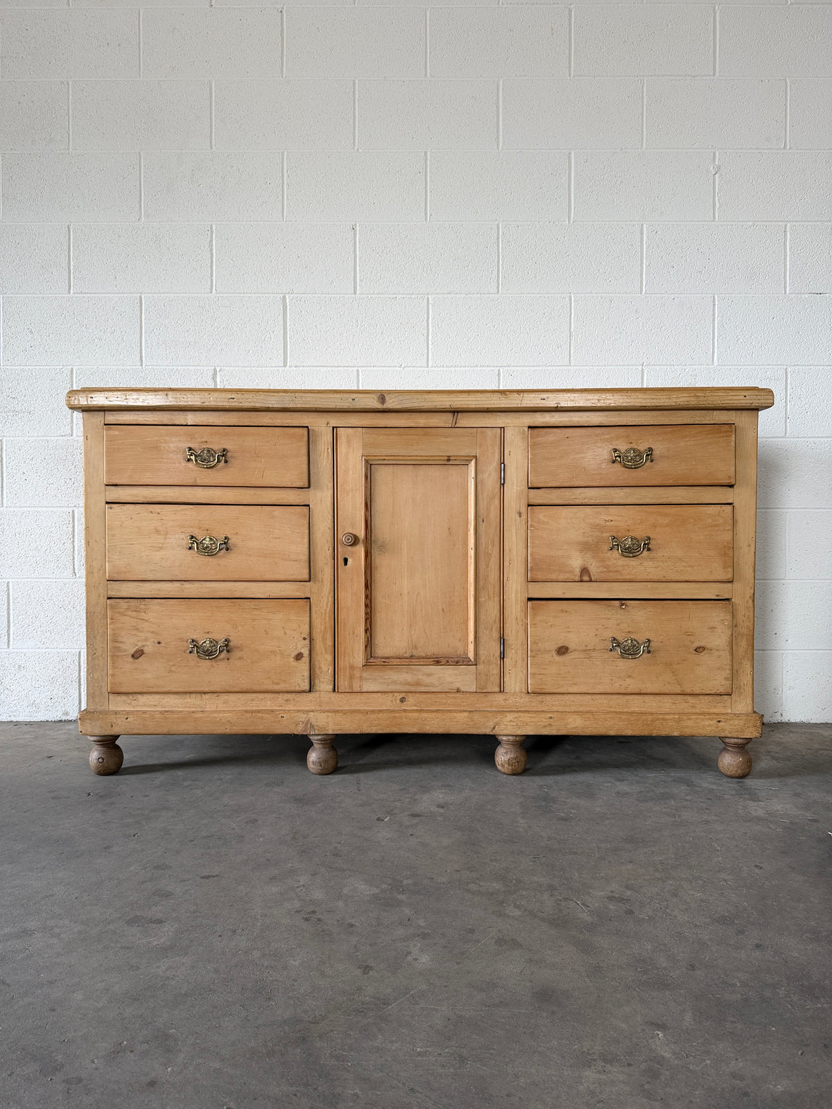 English pine sideboard with decorative pulls
