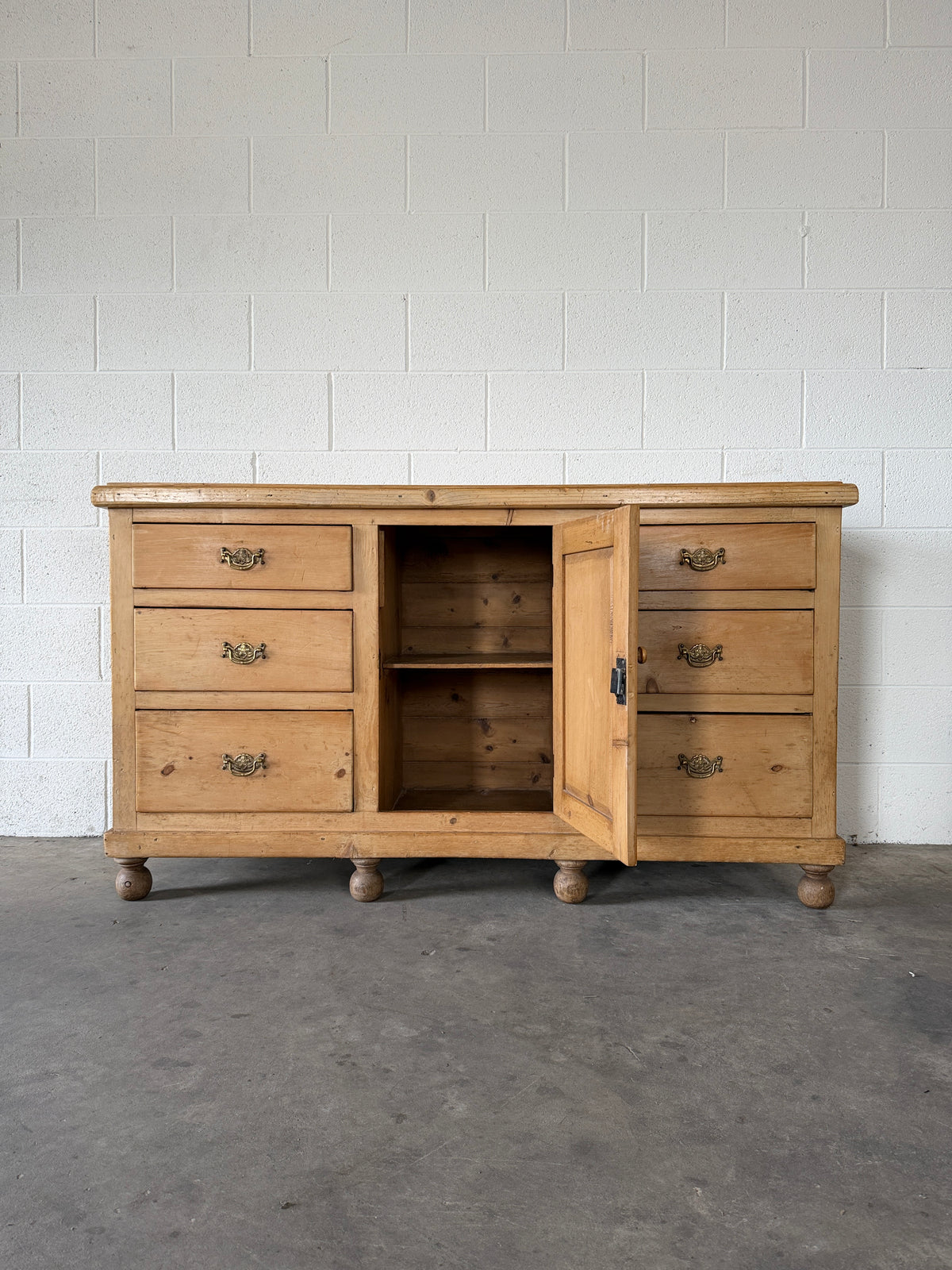 English pine sideboard with decorative pulls