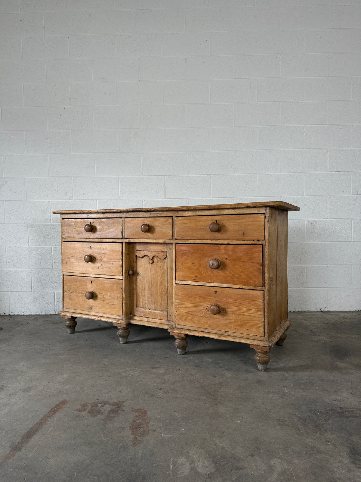 Antique pine sideboard with 7 drawers
