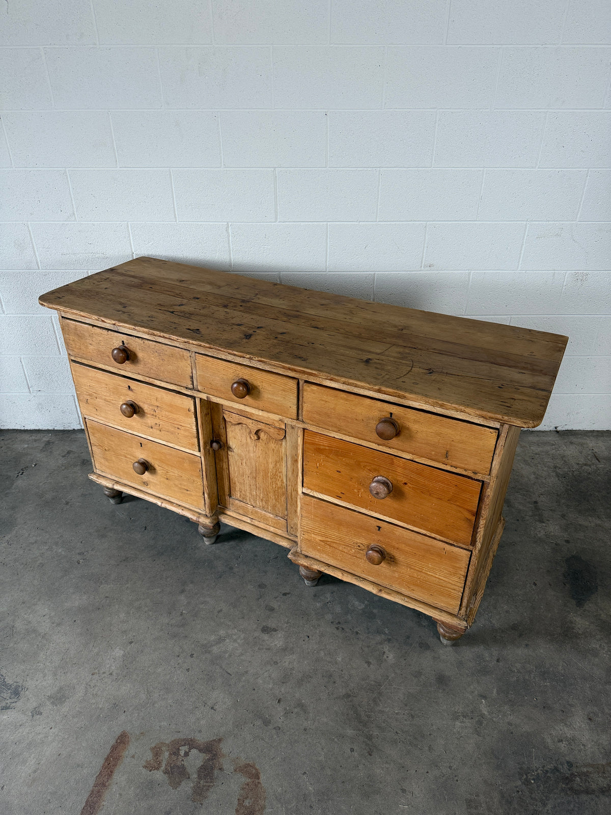Antique pine sideboard with 7 drawers