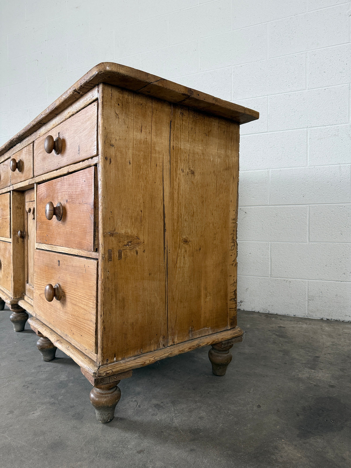 Antique pine sideboard with 7 drawers