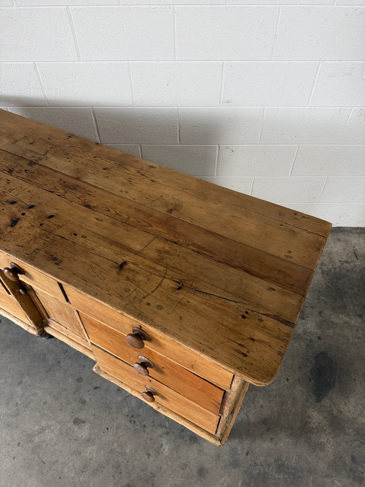 Antique pine sideboard with 7 drawers