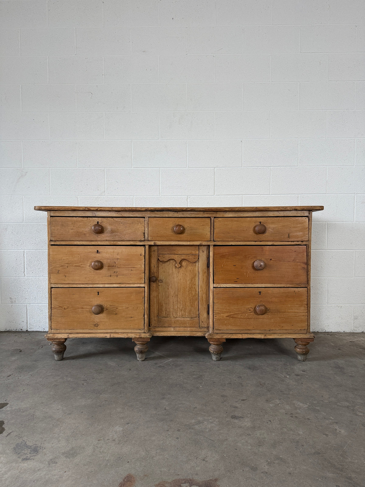 Antique pine sideboard with 7 drawers