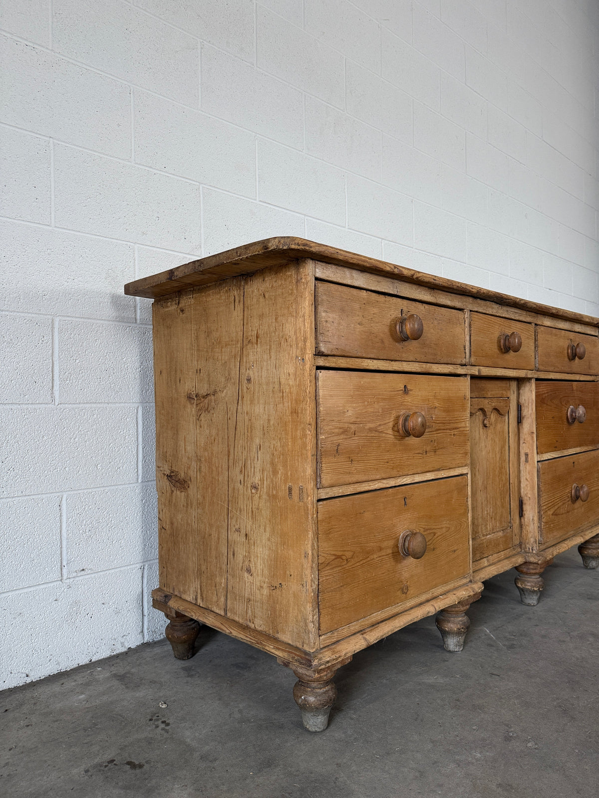 Antique pine sideboard with 7 drawers
