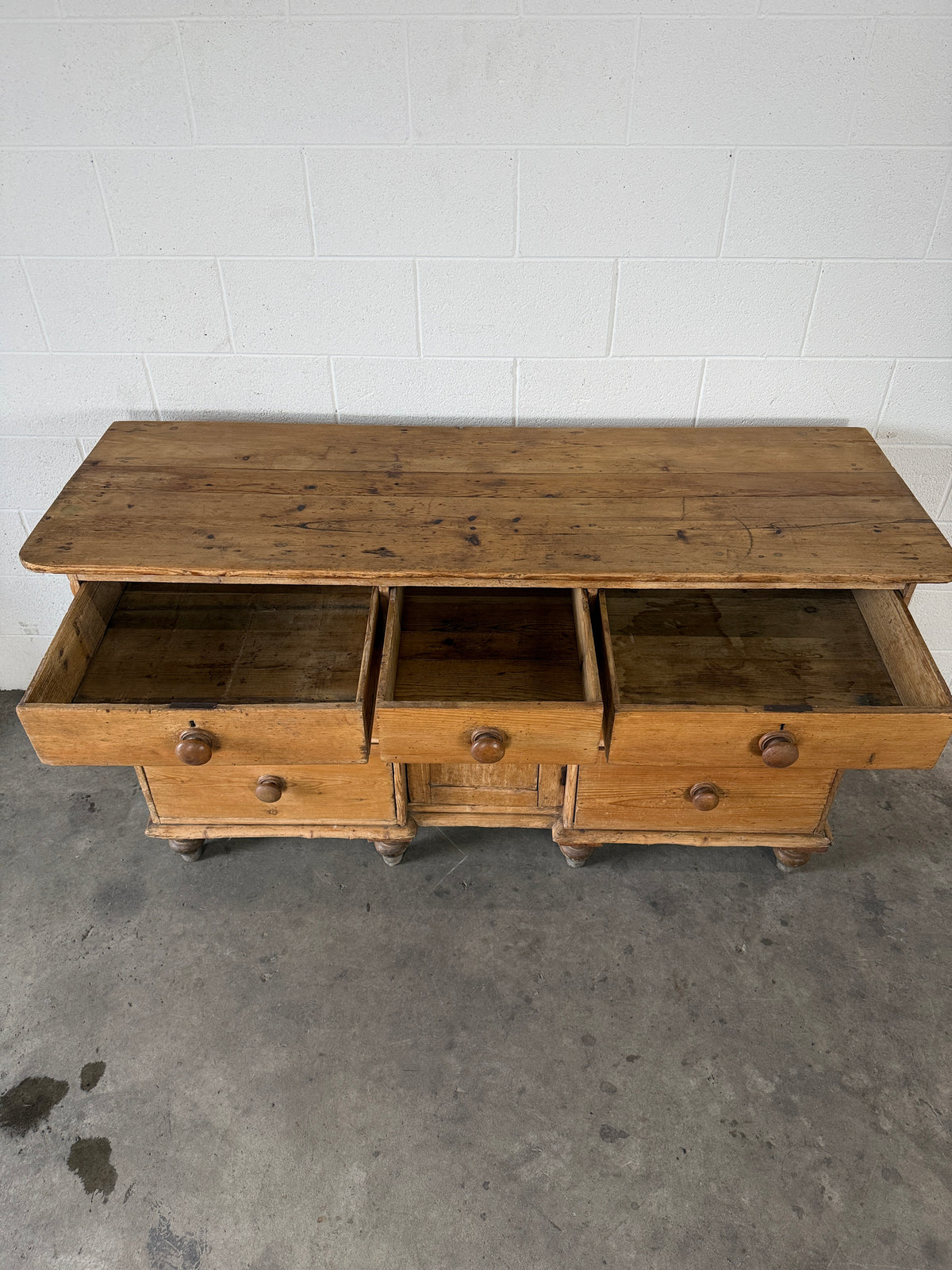 Antique pine sideboard with 7 drawers