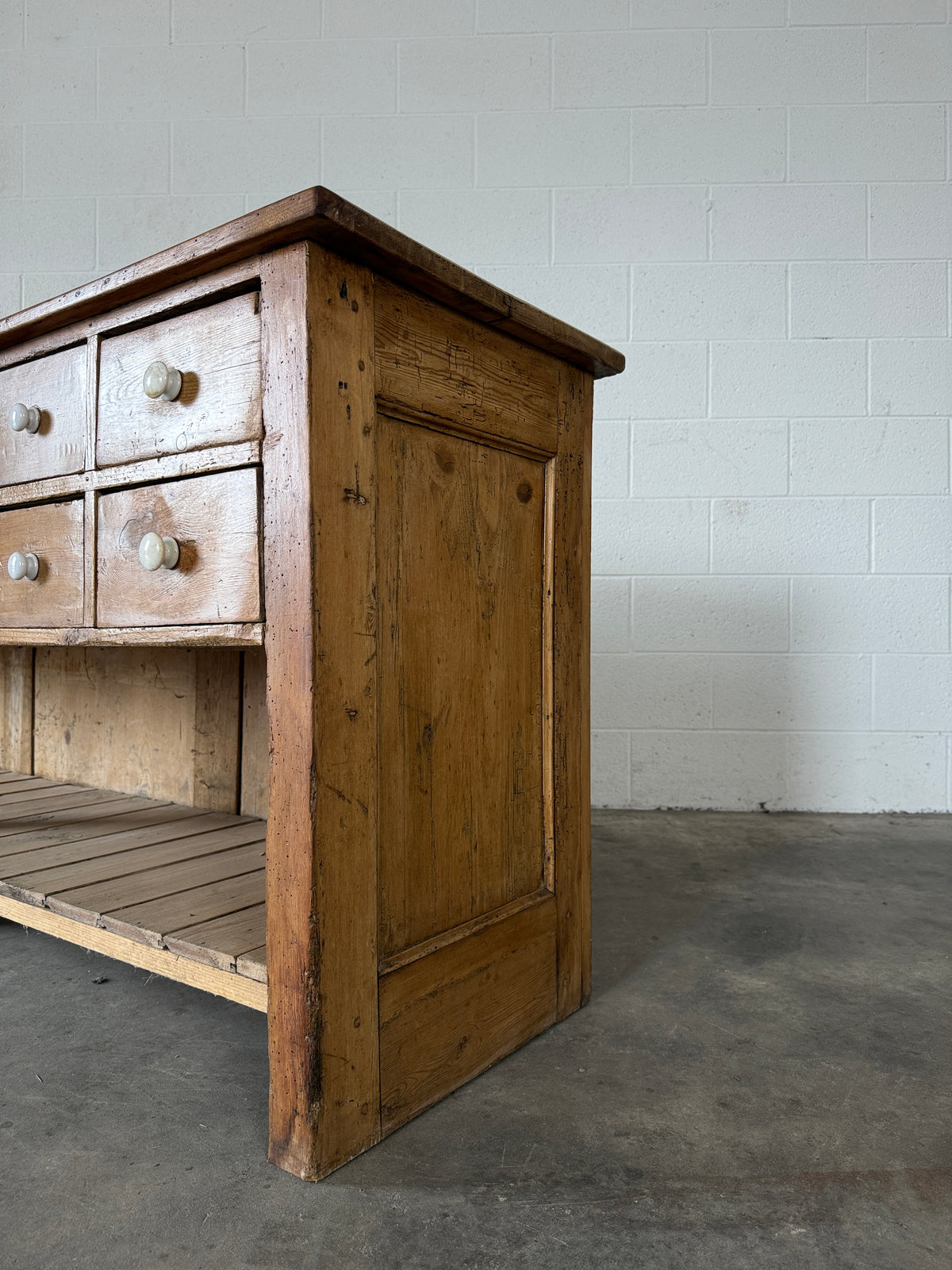 English antique pine shop counter with 15 drawers