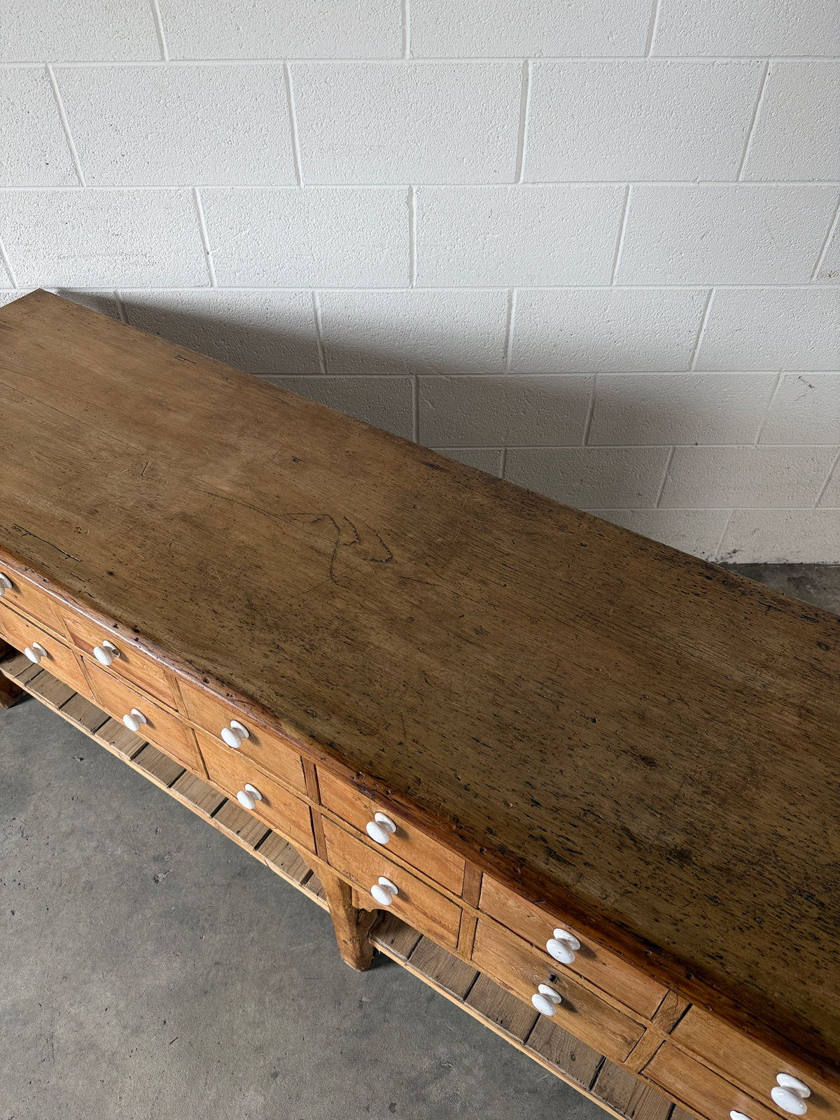 English antique pine shop counter with 15 drawers