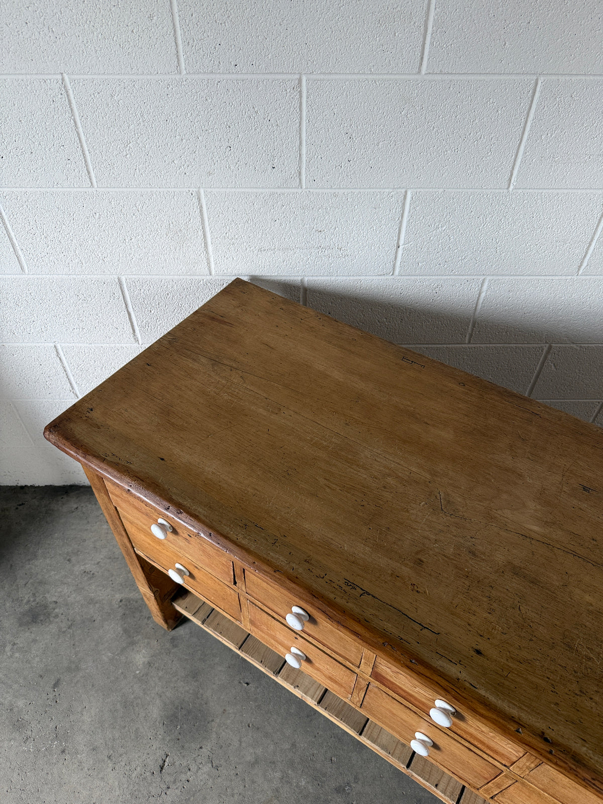 English antique pine shop counter with 15 drawers