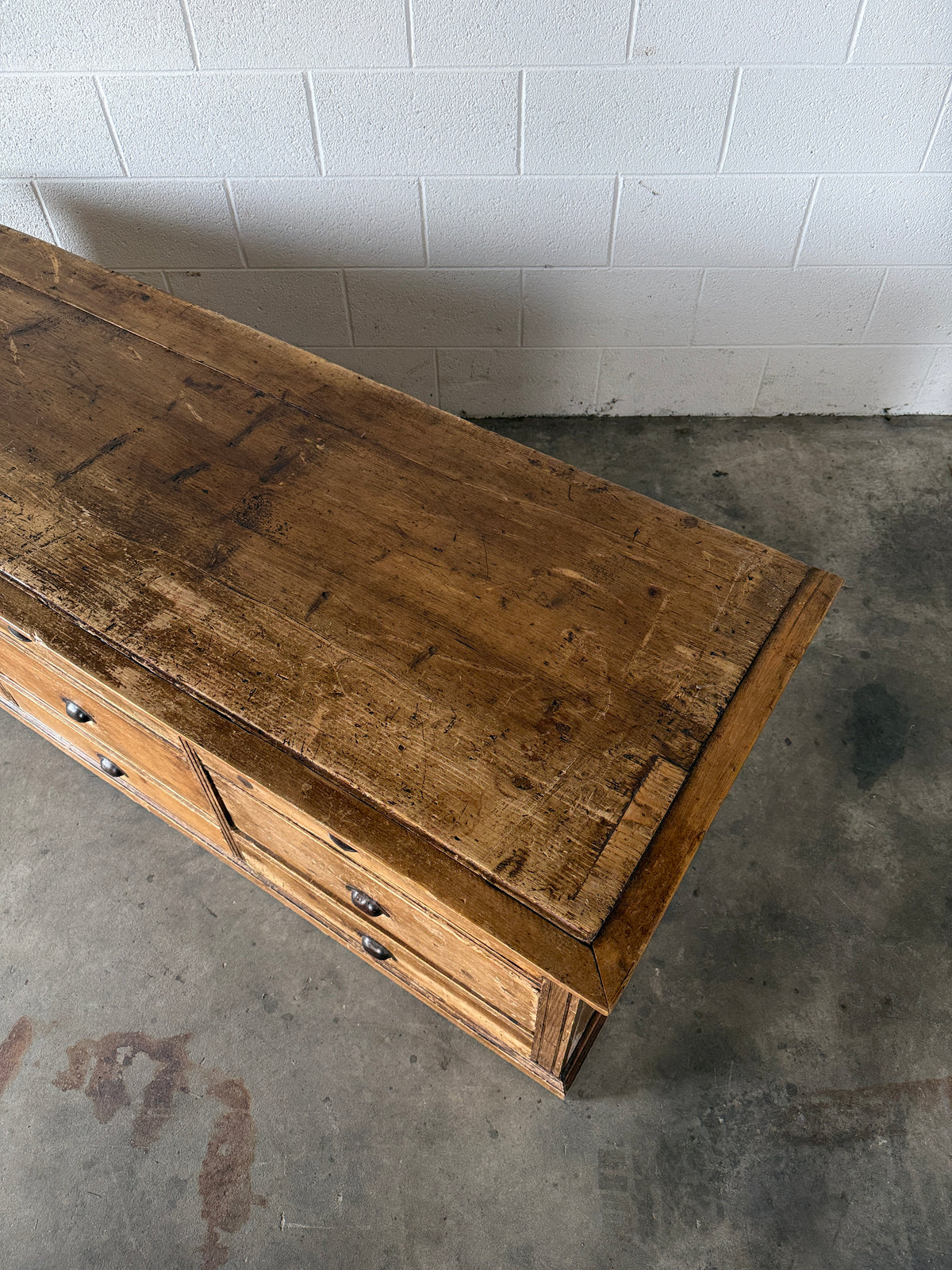 Low bank of 9 antique European drawers