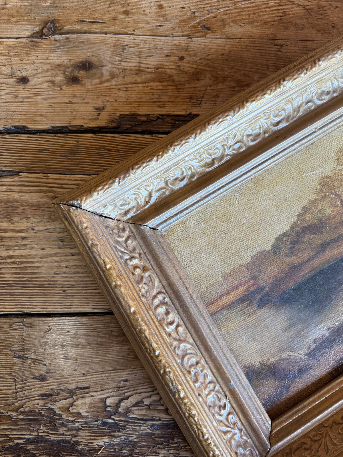 Antique landscape in wooden frame