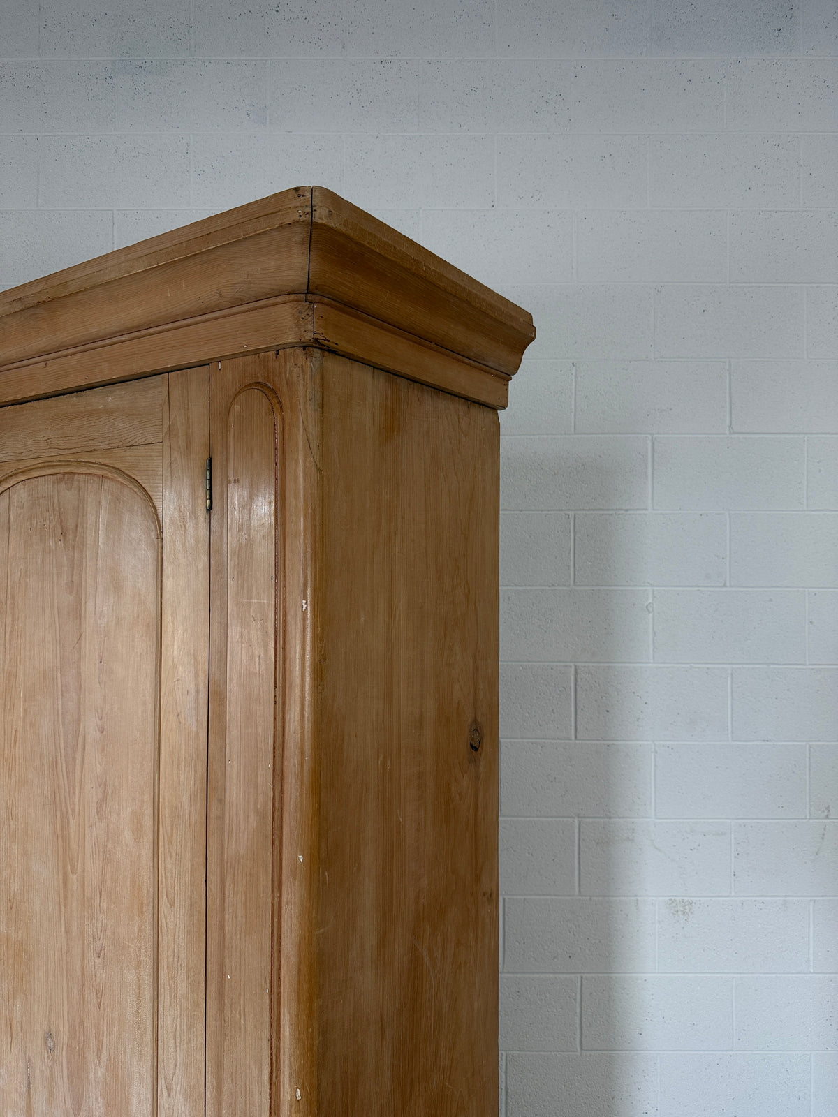 Single antique pine wardrobe with drawers at the base