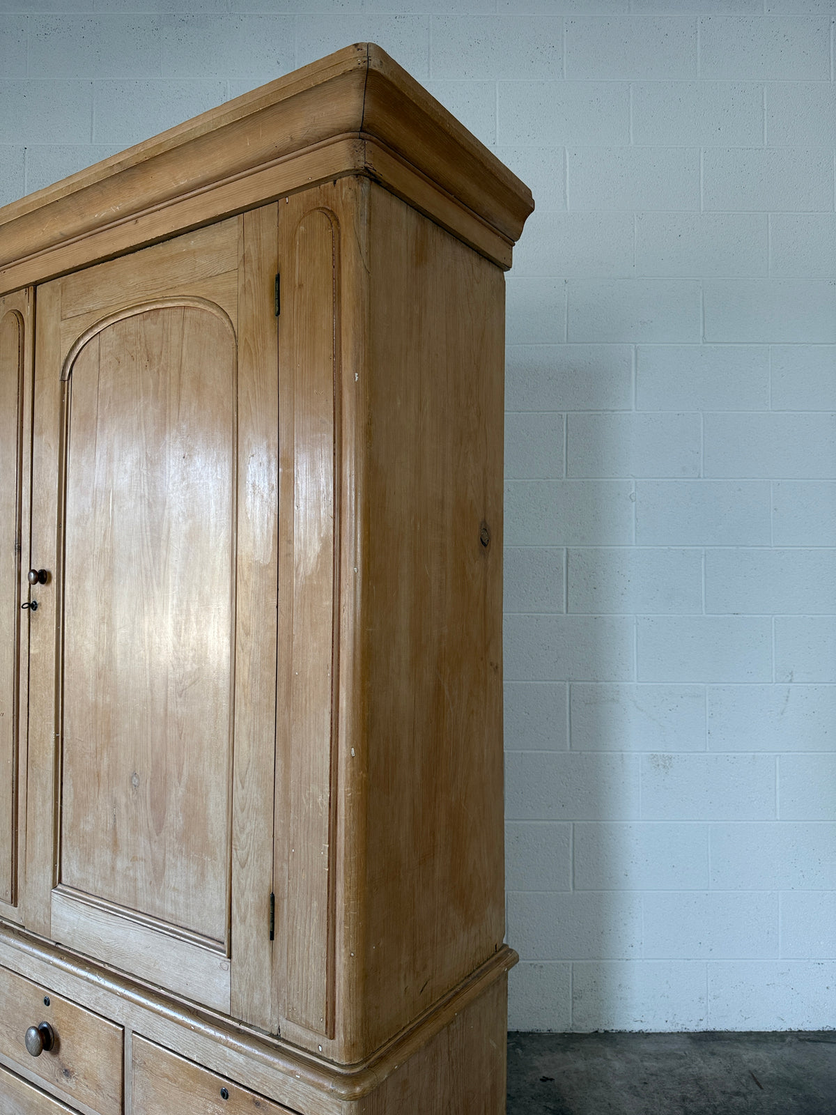 Single antique pine wardrobe with drawers at the base