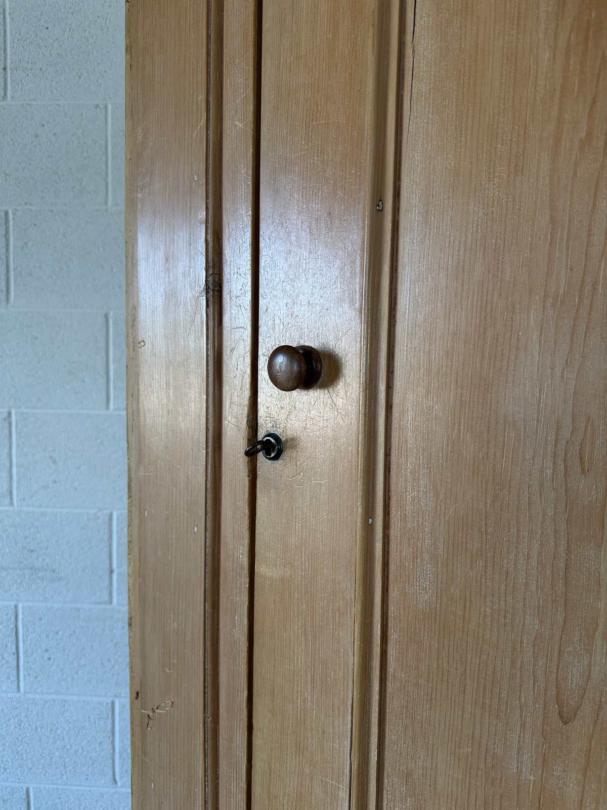 Single antique pine wardrobe with drawers at the base