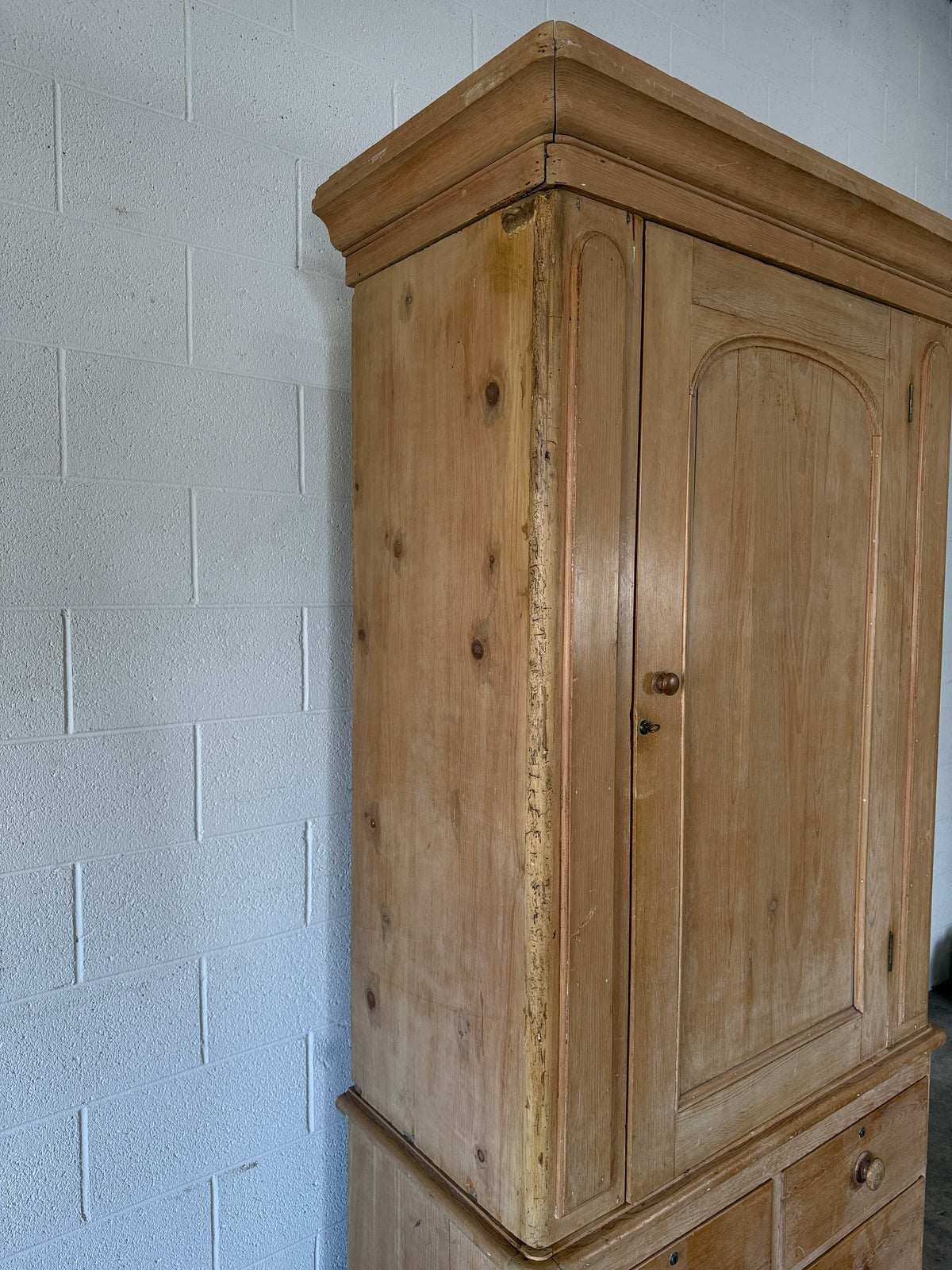 Single antique pine wardrobe with drawers at the base