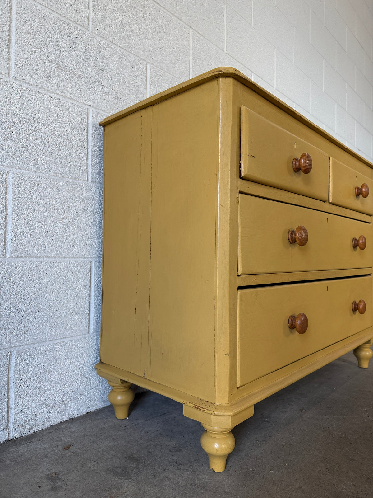 Antique pine drawers painted yellow