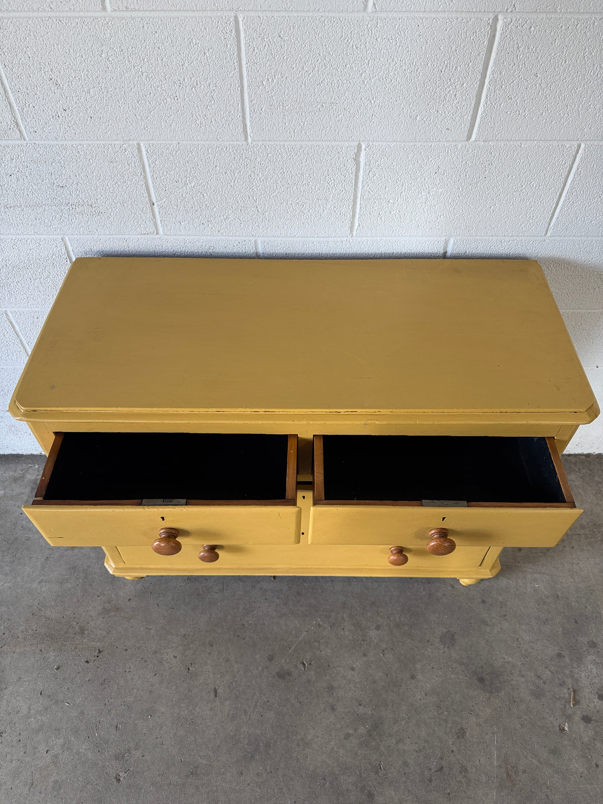 Antique pine drawers painted yellow