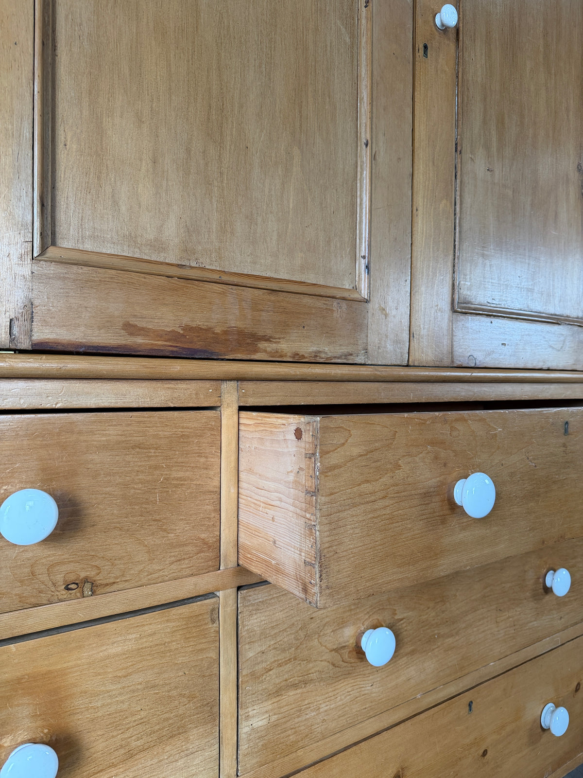 Housekeepers cupboard with six base drawers