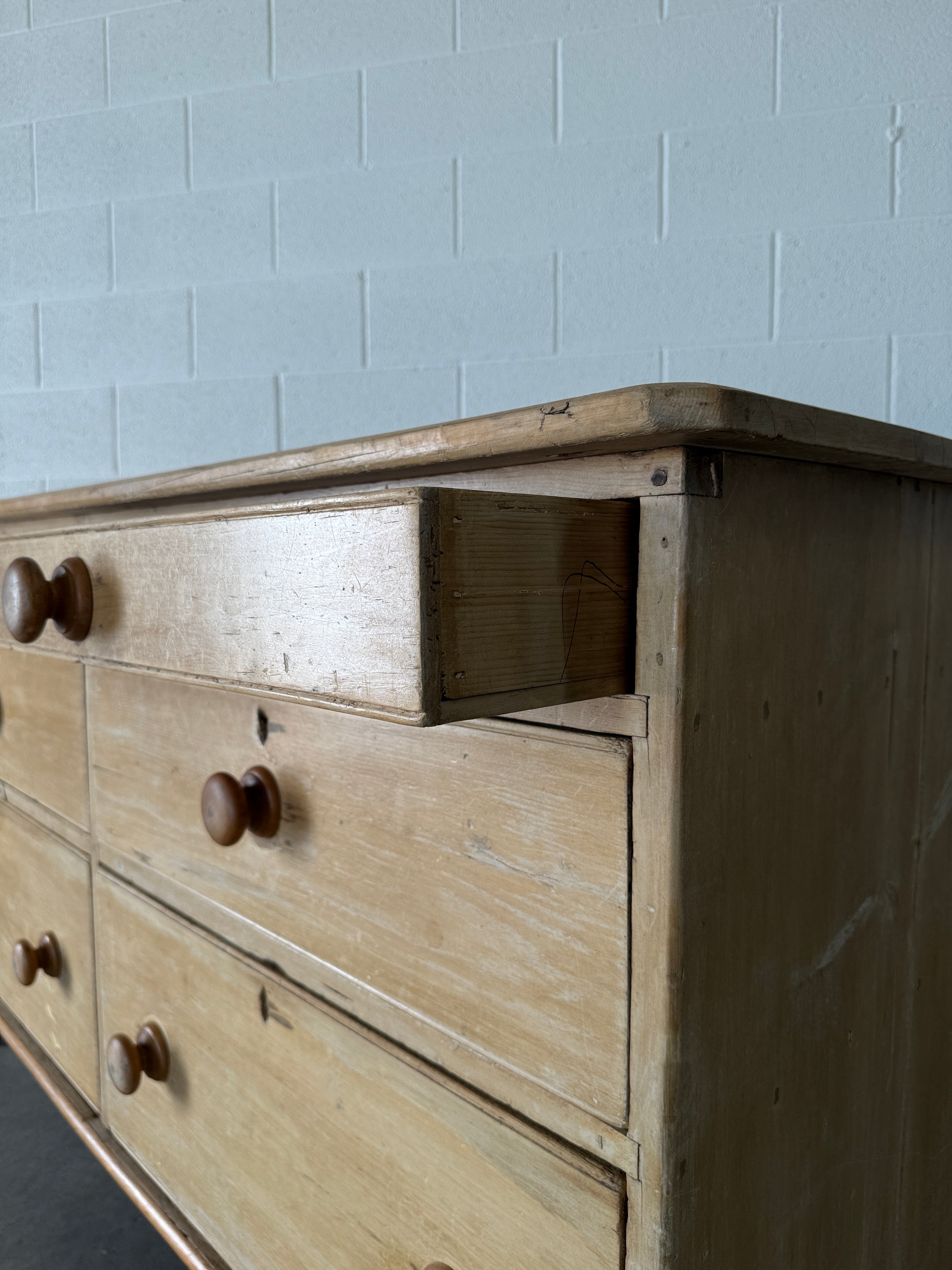 Antique pine six drawer sideboard