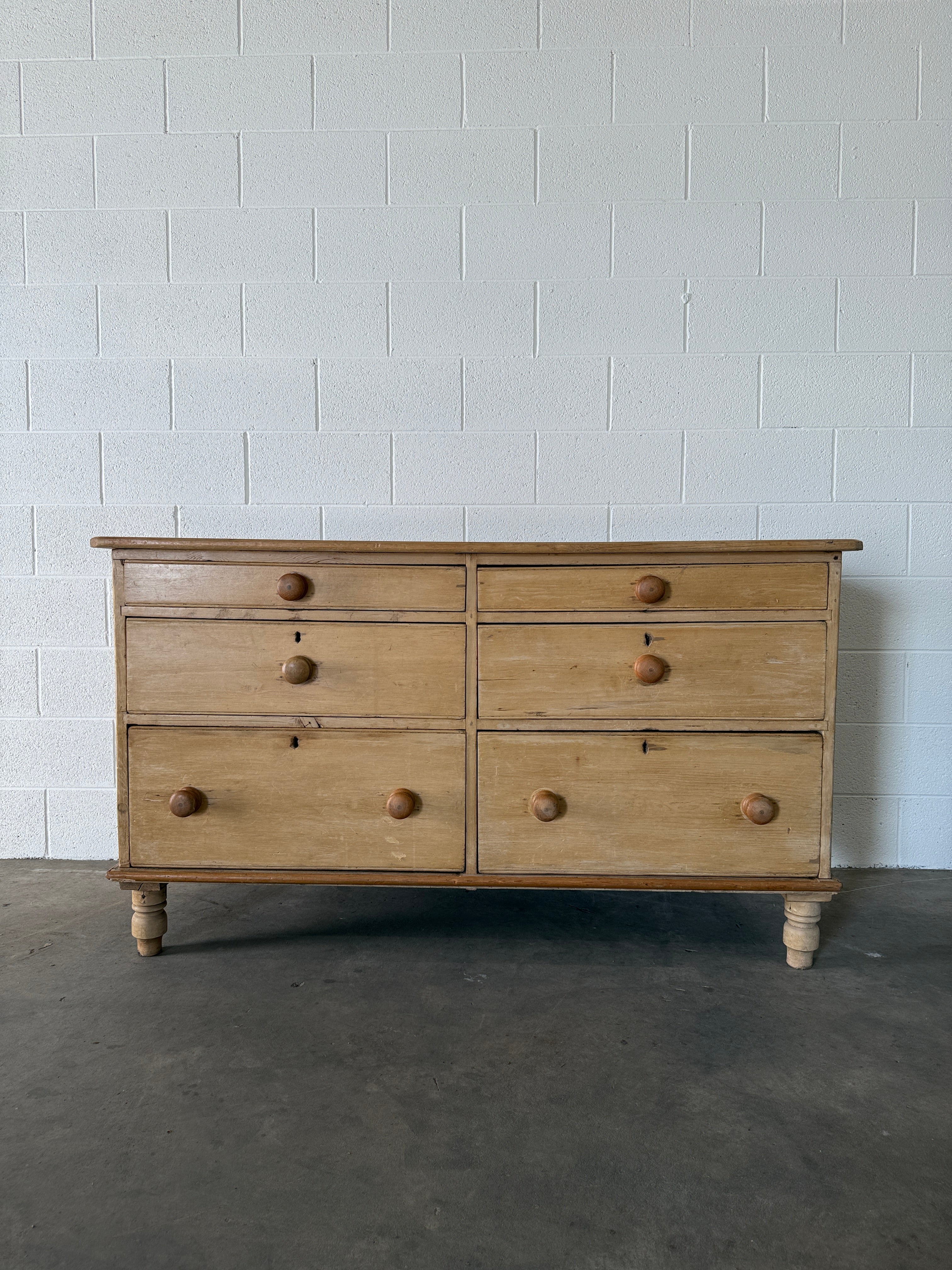 Antique pine six drawer sideboard
