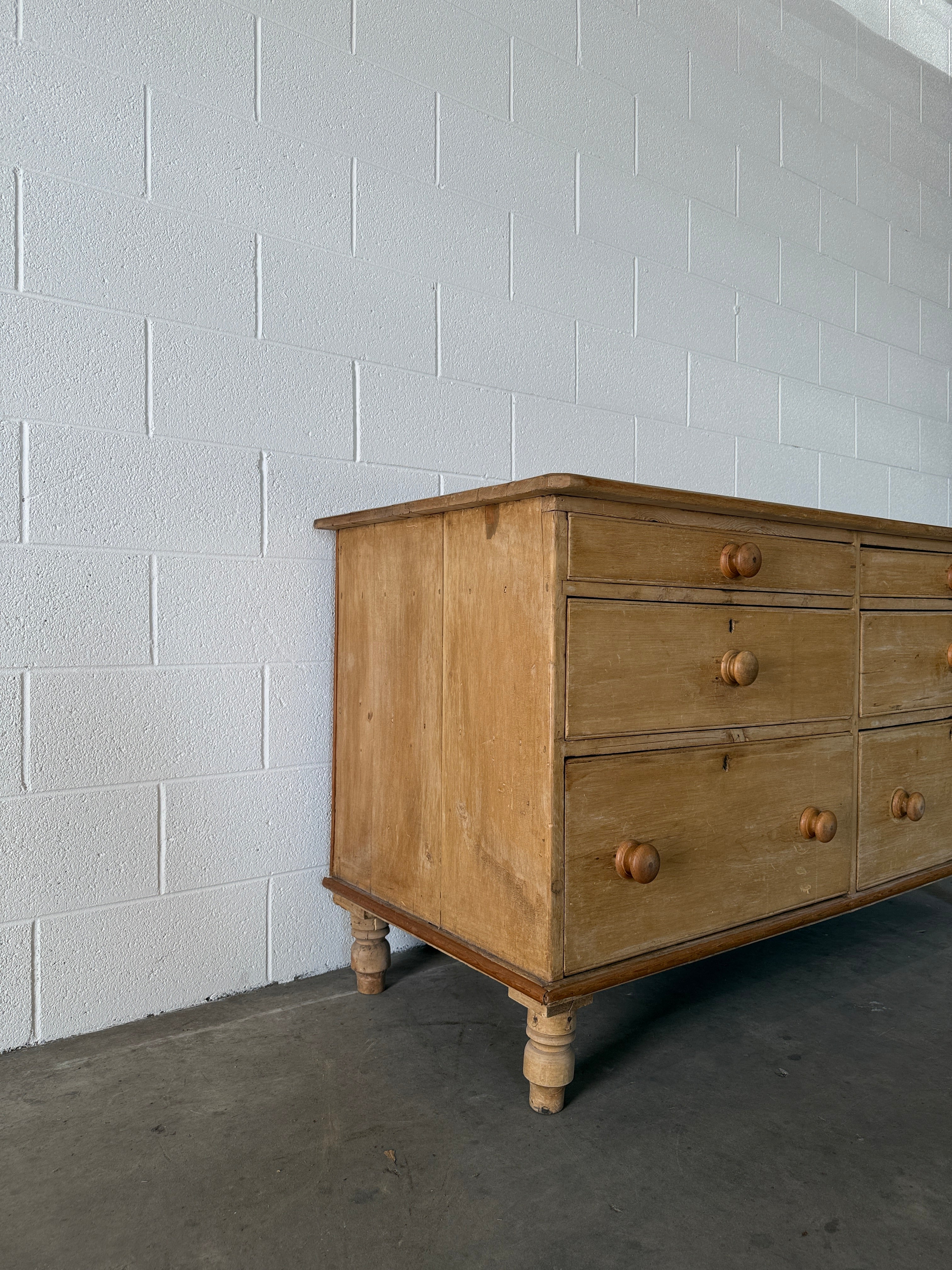 Antique pine six drawer sideboard