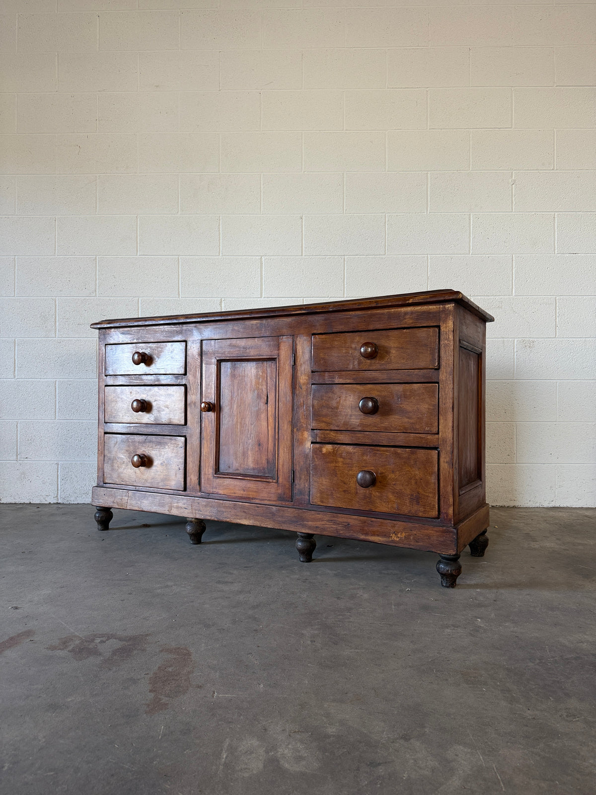 Antique sideboard in a dark wax finish