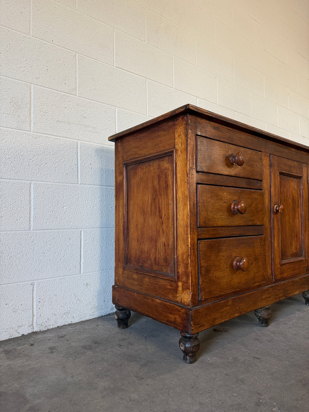 Antique sideboard in a dark wax finish