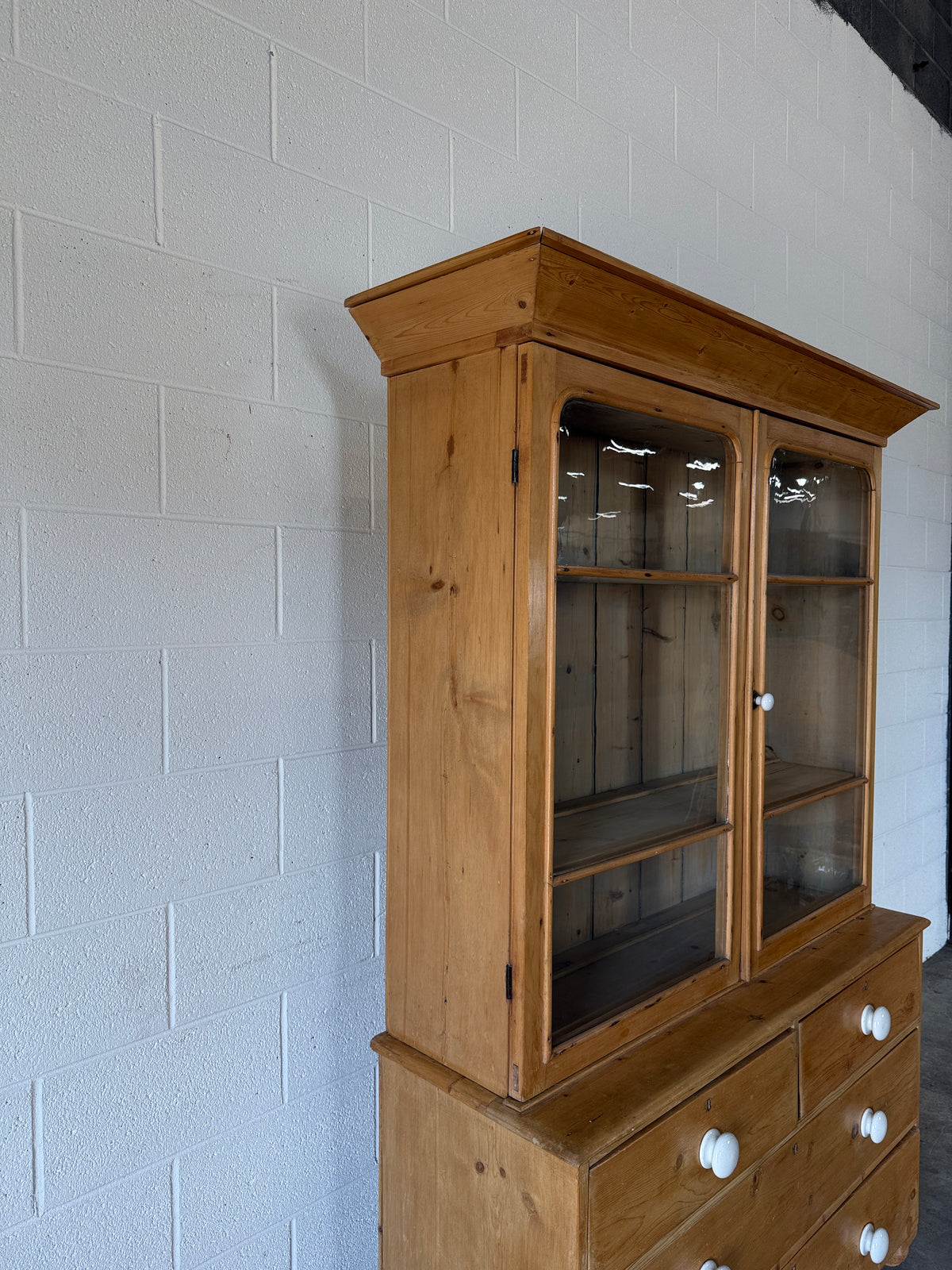 Antique pine glass hutch