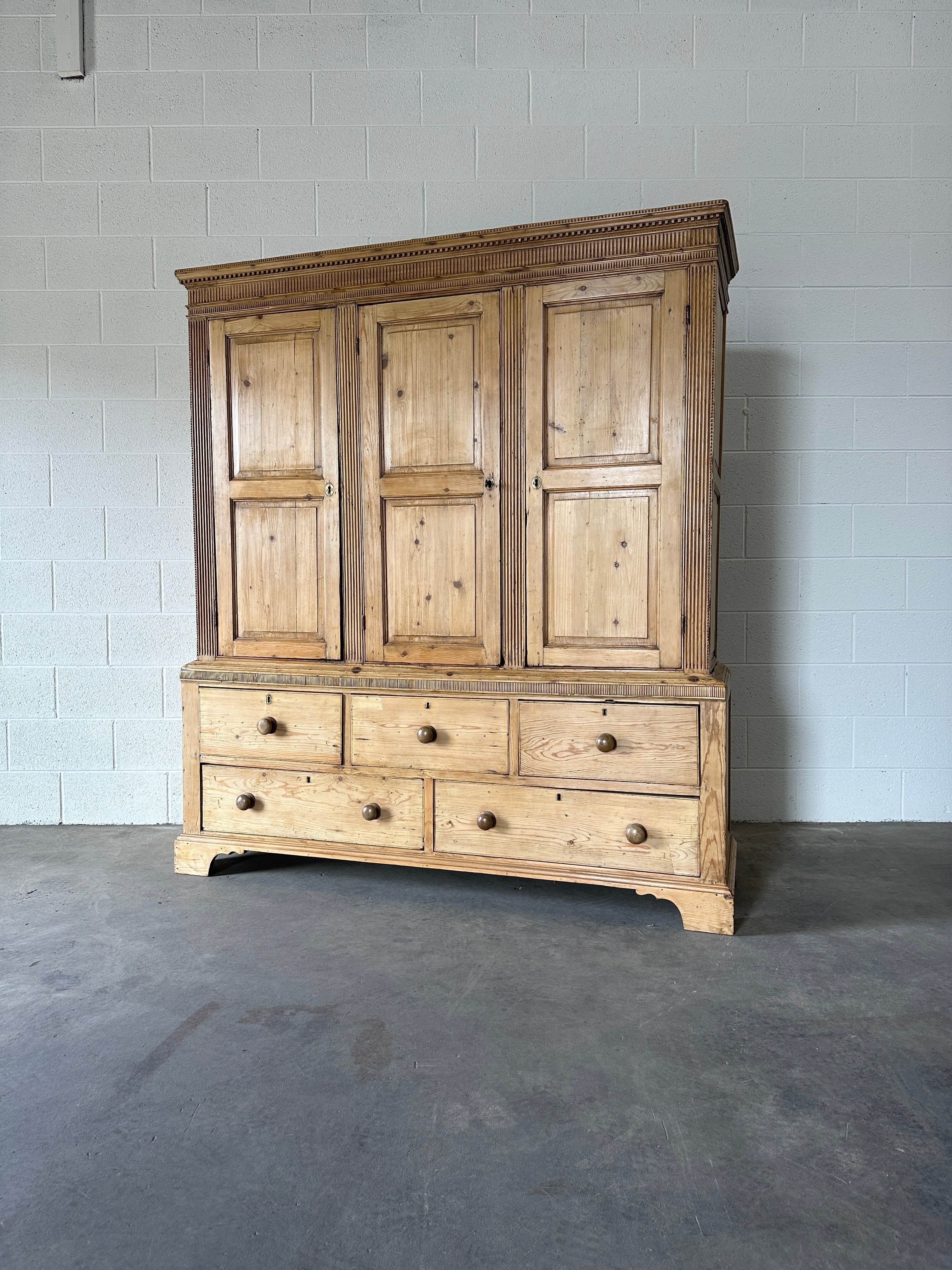 Antique English pine housekeeper’s cupboard