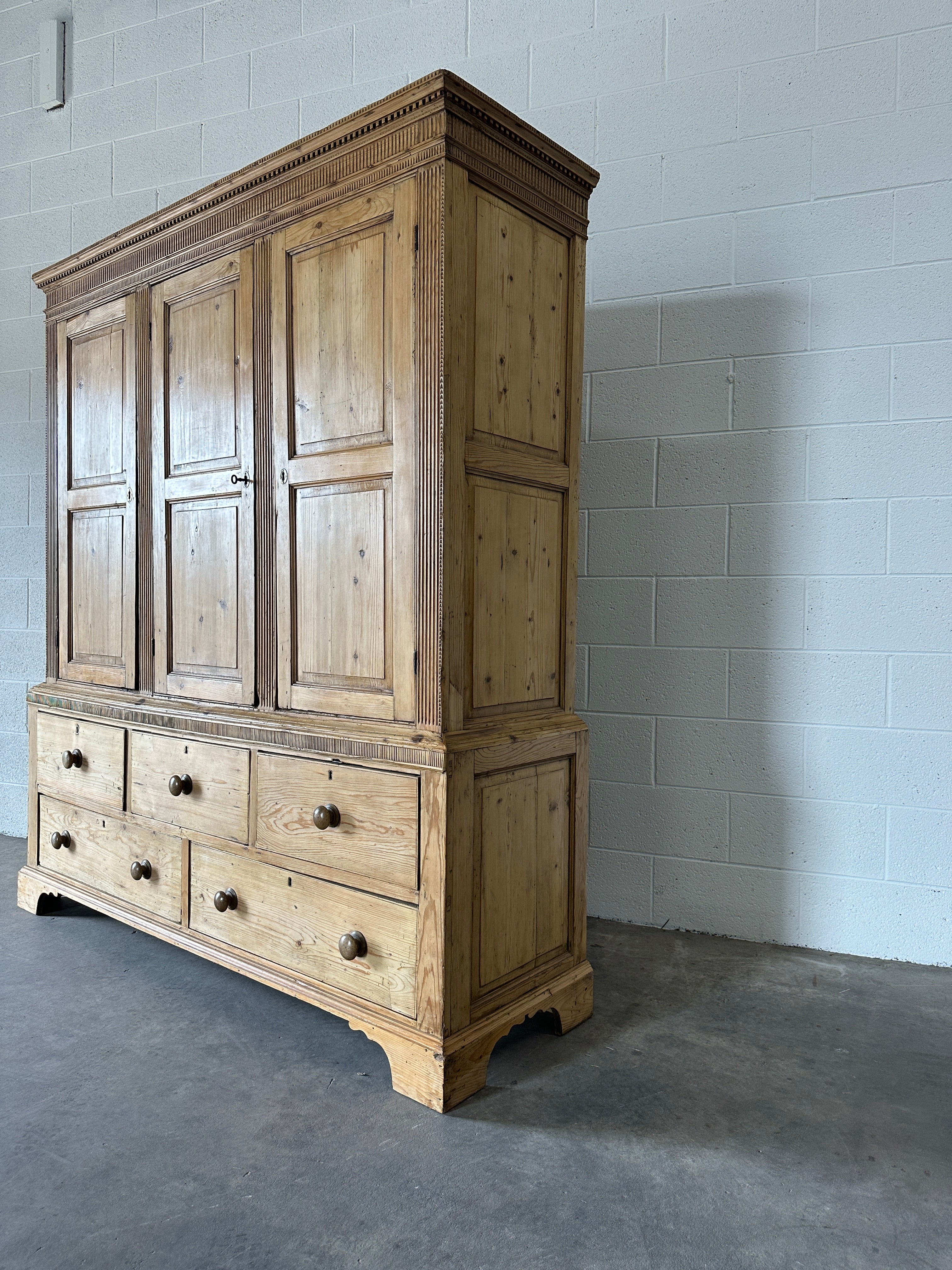 Antique English pine housekeeper’s cupboard