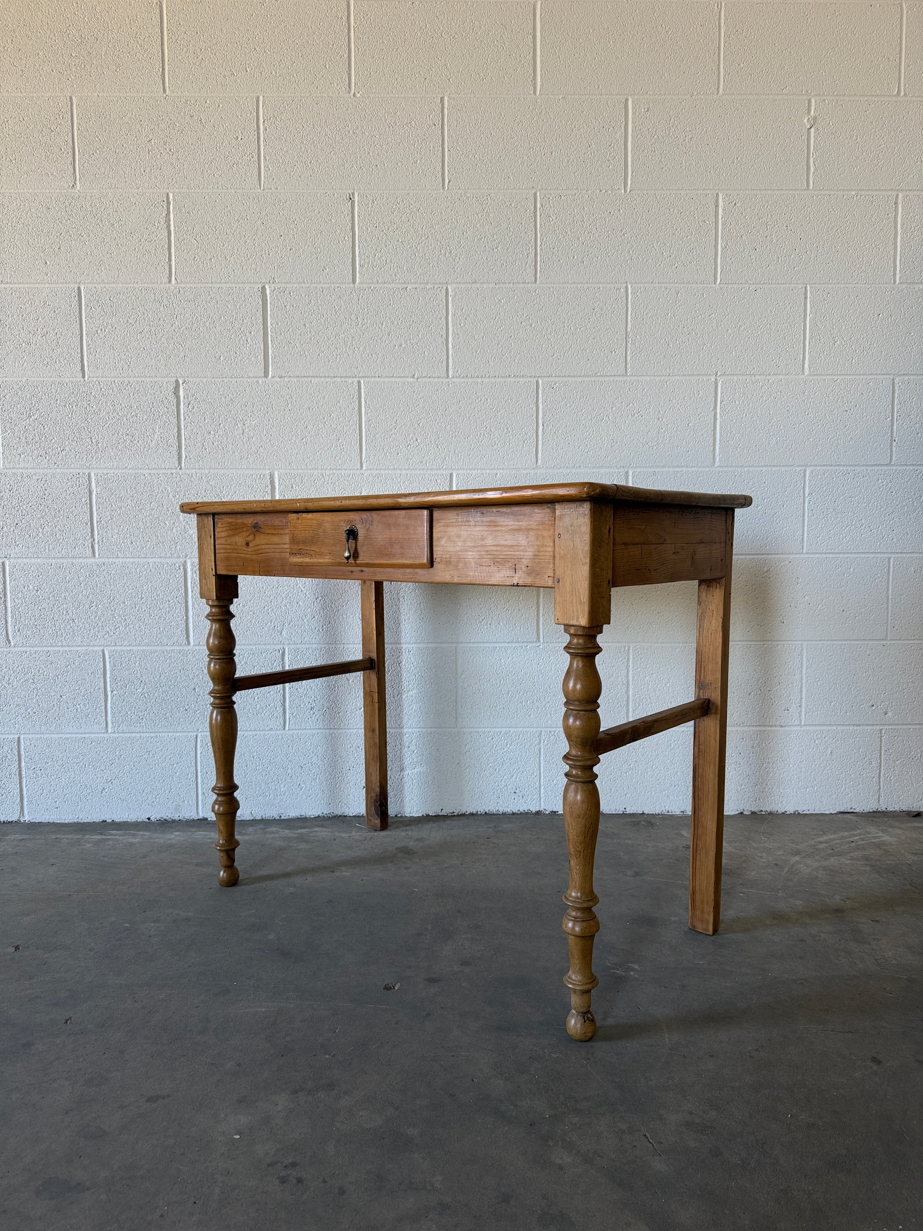 Antique pine side table with a teardrop handle