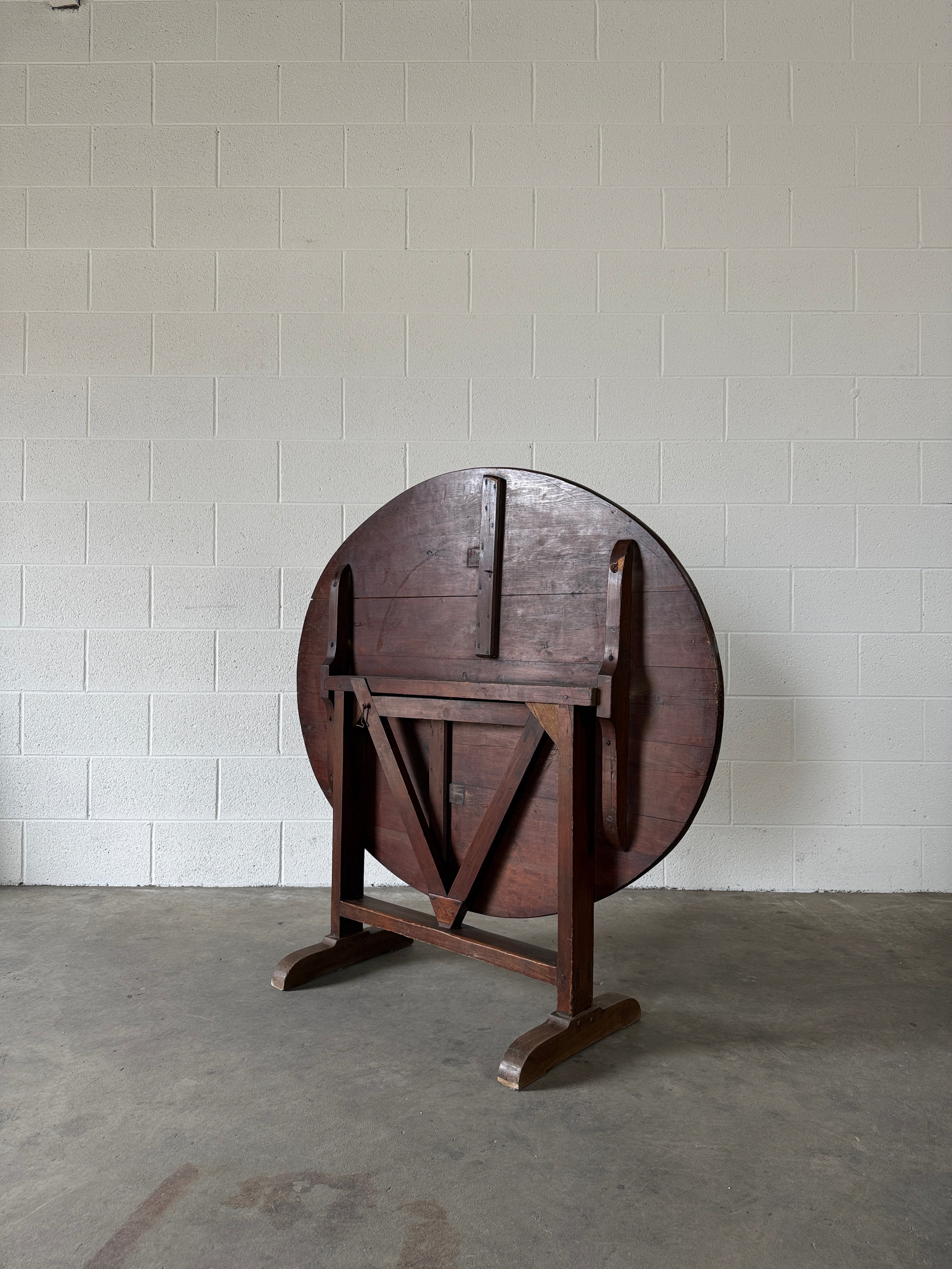 Antique French tilt‑top vendange table