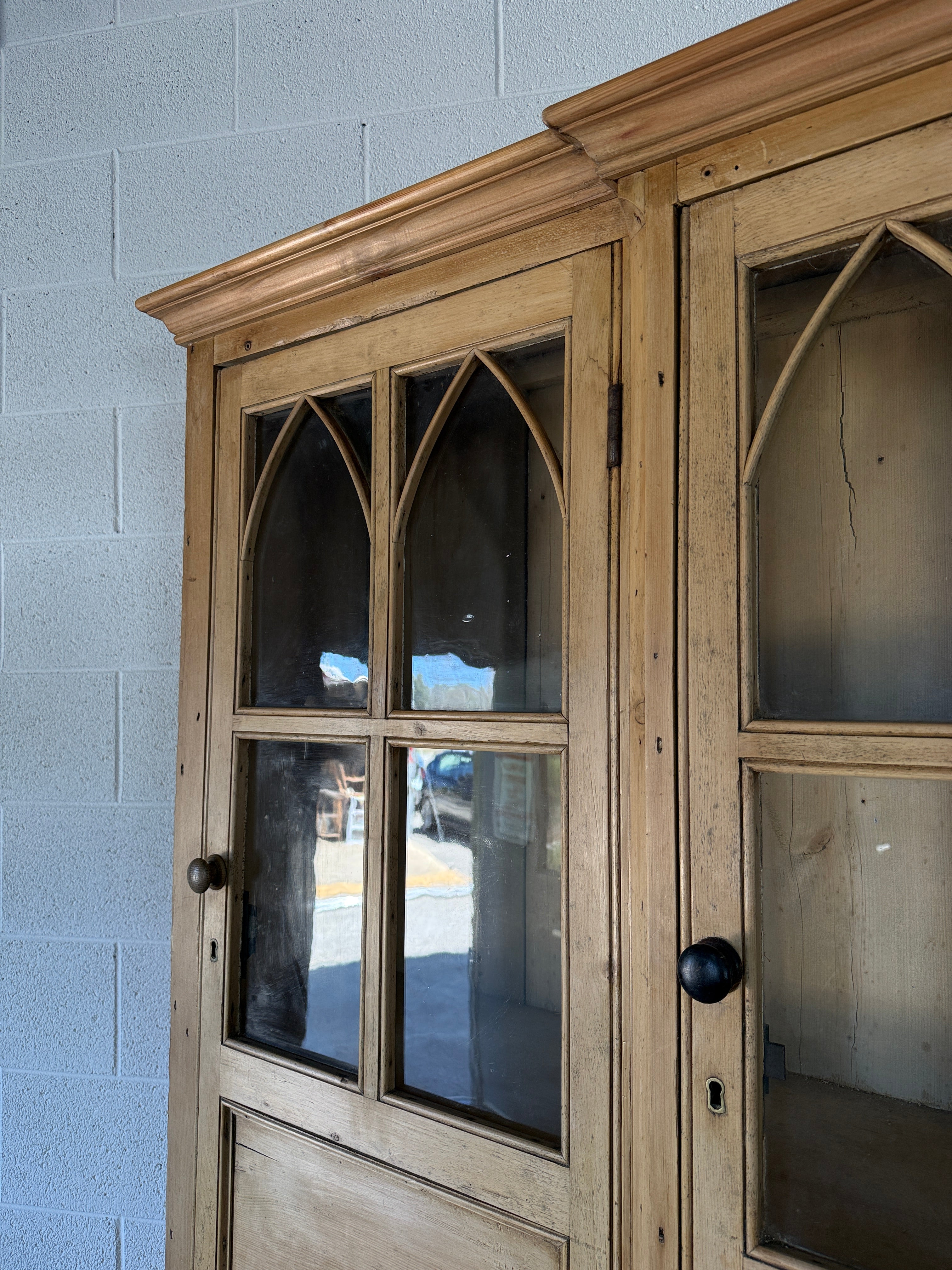 19th‑century English pine cupboard or display case with glass doors