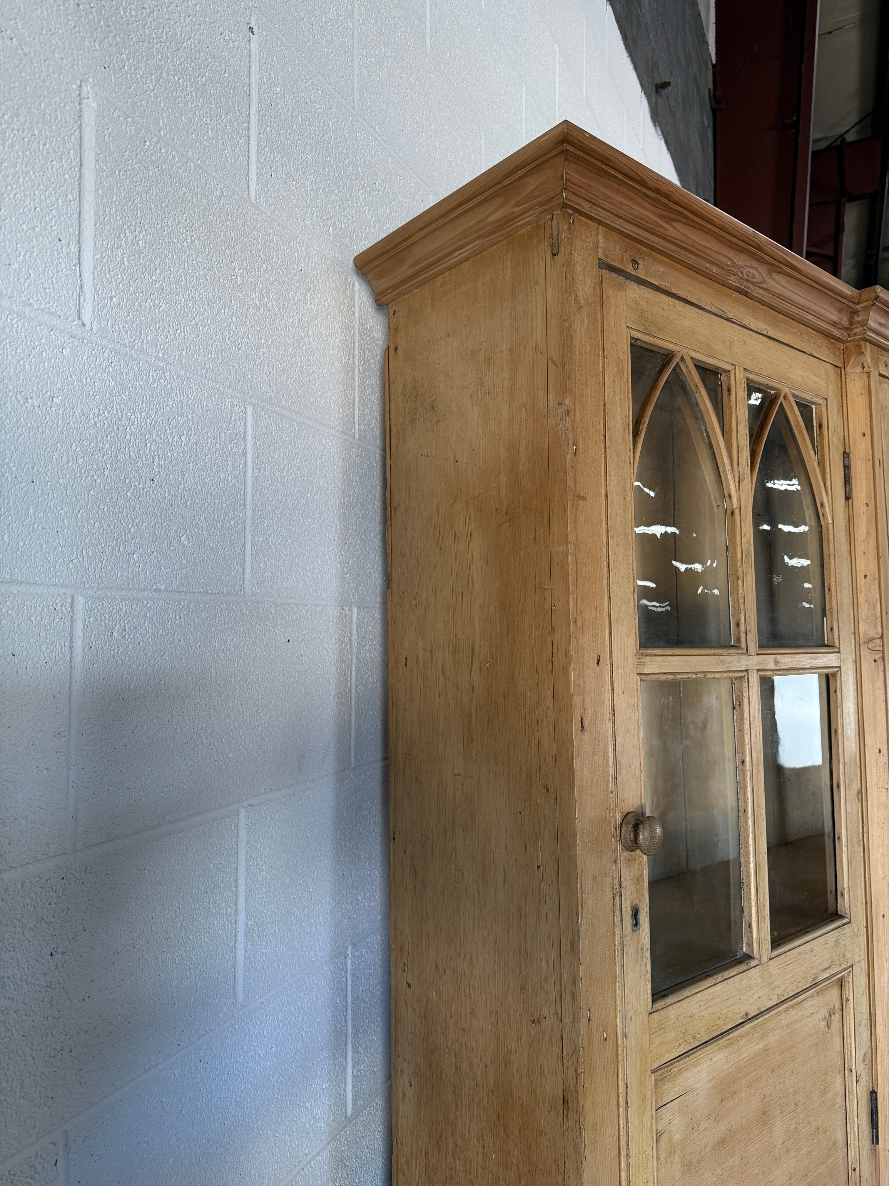 19th‑century English pine cupboard or display case with glass doors