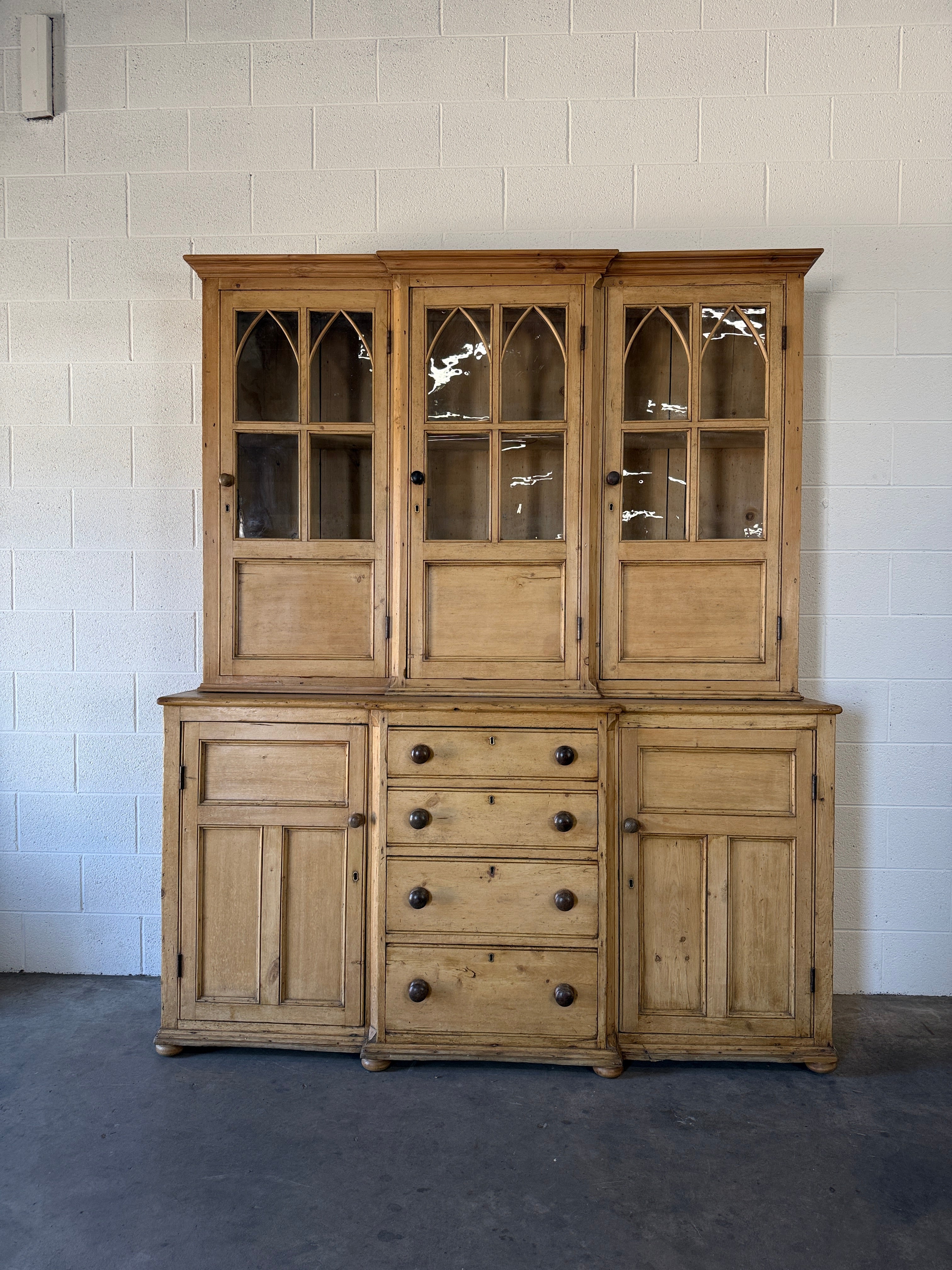 19th‑century English pine cupboard or display case with glass doors