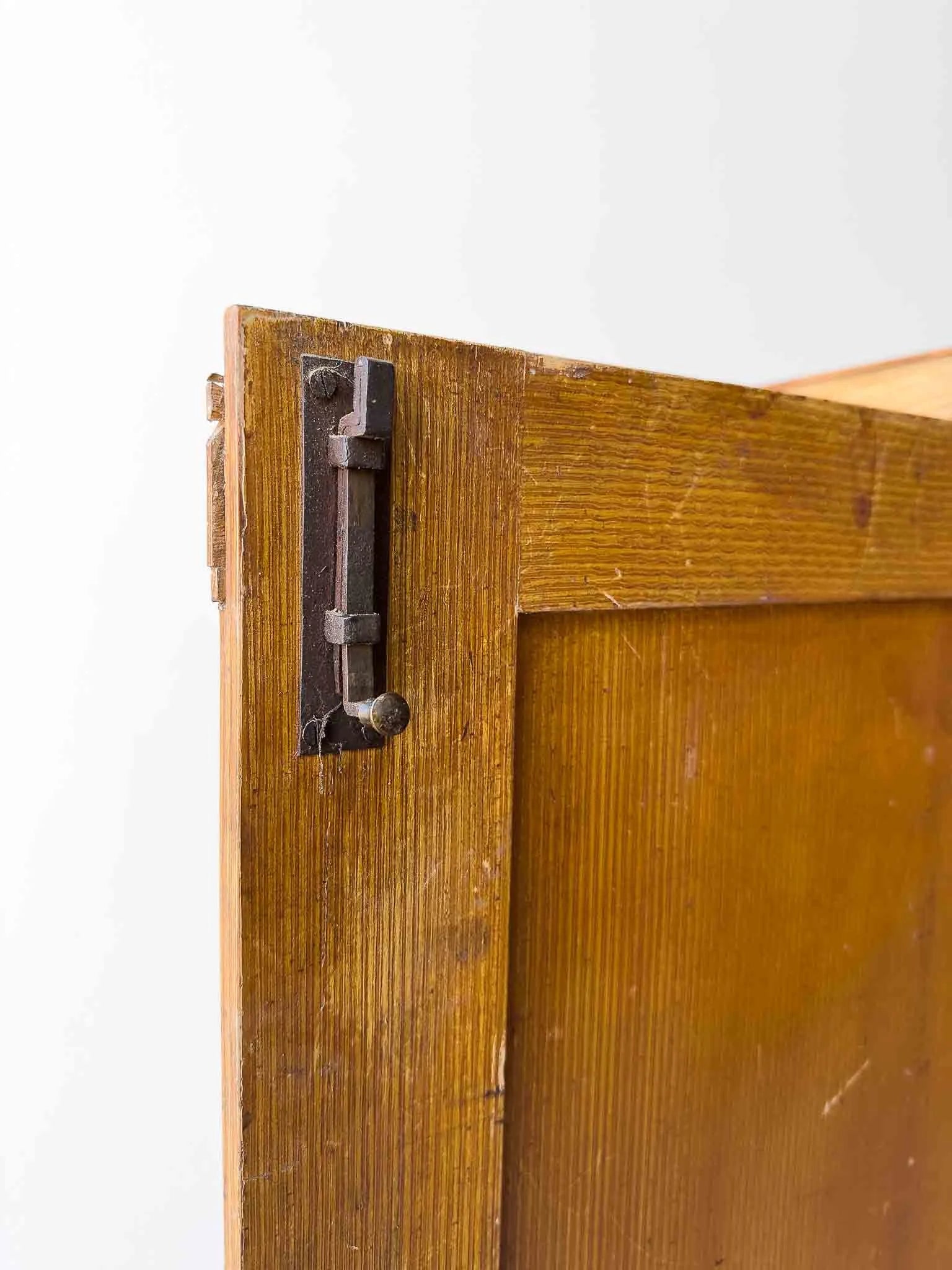 A large antique pine cupboard
