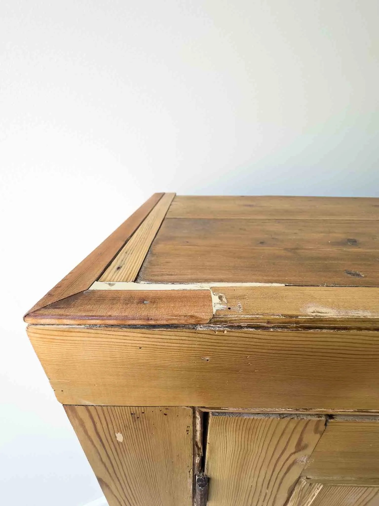 A large antique pine cupboard